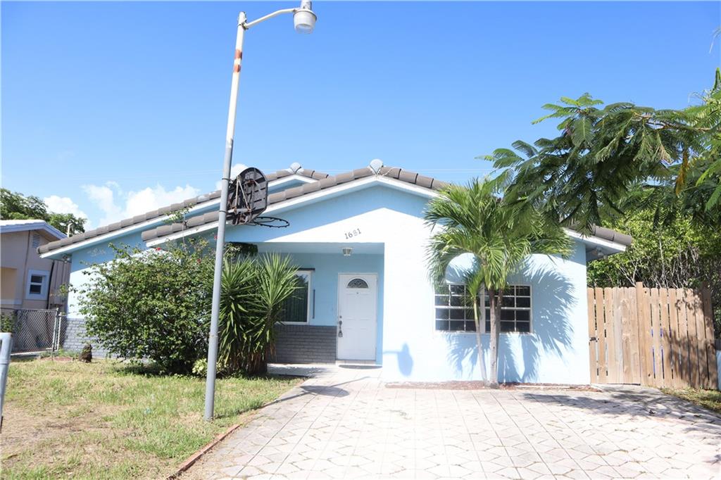 Property is rented on month to month but tenants may sign another lease; buyer must honor the rental. Great home in a fantastic location. Walking distance to Norcrest Elementary School; less than five minute drive to shopping, restaurants, banks and I-95; ten minutes to famous Pompano Beach with a brand new Pier. Brand new roof installed in October 2015. Hurricane Impact window installed in some of the rooms in 2018. A/C less than 6 years old. Apartment suite can be accessed through the house, but also has a separate entrance for convenience. All offers will be presented to owner immediately after received.