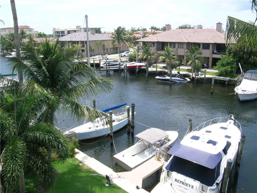Rarely available waterfront 3/2 with its own dock for a 35ft. boat, a private 2 car garage, heated pool and spa, high ceilings, huge luxury master bedroom and bath, top of the line kitchen, in unit laundry and terrace all in a fantastic boutique building at a great location close to everywhere you want to be! **WATERFRONT - Canal Width 81-120 Feet, No Fixed Bridges, Ocean Access
