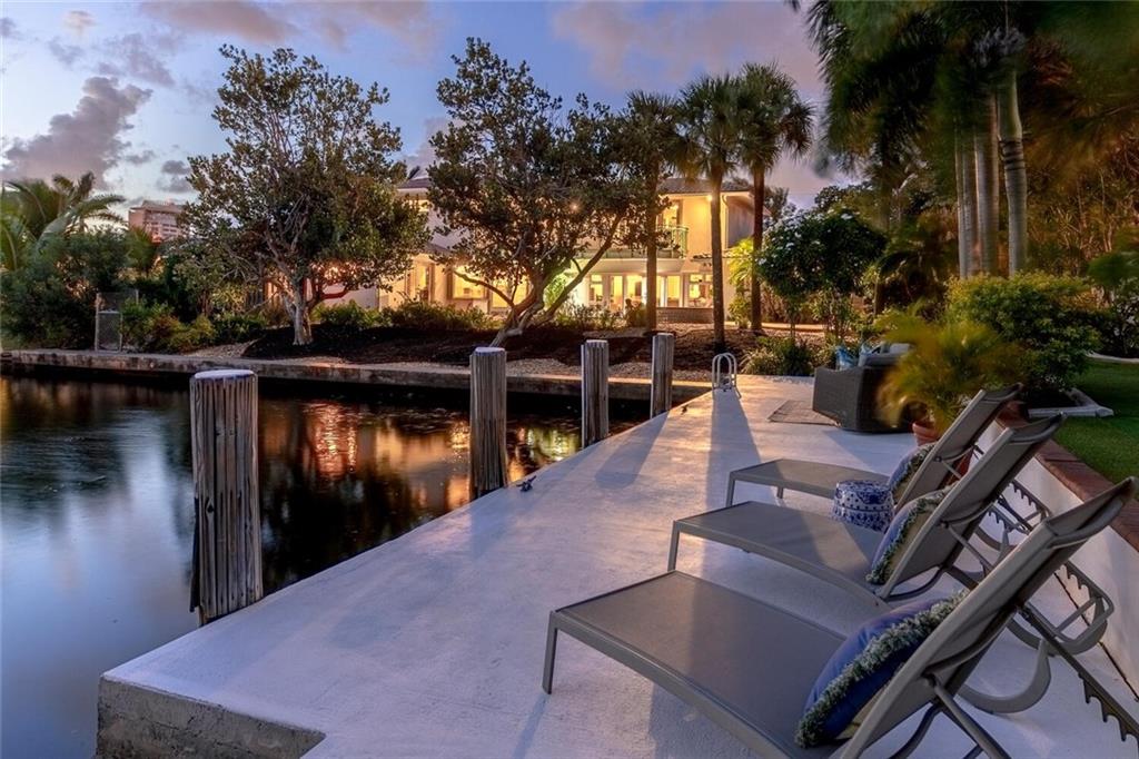 Unique & private 13,383 SF waterfront corner lot, tucked away in a coveted Fort Lauderdale beachfront enclave. An entertainers paradise featuring 130' of water frontage with 1 fixed bridge, a heated saltwater pool with spa, private putting green, multiple outdoor lounging and dining areas, all overlooking a wide canal. In this 4,100 SF home you'll find 5 spacious bedrooms (one of which can be closed off as a guest house), 5 full baths, an eat-in kitchen with dual pantries, piped-in natural gas, 3 zones of air conditioning, 2 water heaters, volume ceilings, a 2 bay garage and custom walk-in closets. Just a short walk to the beach from this wonderful home, makes it the perfect Florida retreat! *Information is from 3rd party sources including BCPA and is believed accurate but not warranted.*