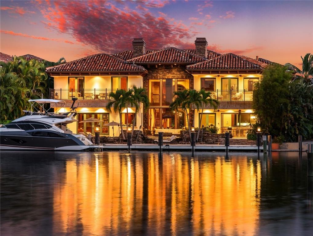 For the discerning buyer seeking a totally unique custom deepwater residence, West Coast Contemporary has o $1M + in custom finishes alone!The detailing is typically only found at much higher price points & the residence shows as brand new. OFFERED FULLY FURNISHED! Enjoy a dramatic 2-story living room & four sided fireplace overlooking the pool & superb long waterway views to the bridge (no house directly across)+ wide turning basin. Elegant formal & living rooms,fabulous Chef's kitchen open to the family room plus Club Room/water facing bar, steam room/cabana bath & downstairs bedroom suite. 2nd level fully customized Media Room with adjoining entertaining area, spacious bedrooms & ultra-luxurious Master Suite, large private balcony, custom closets & amazing spa-style bathroom & fireplace - There is one bedroom suite downstairs which is currently used as a gym. - The movie theatre and adjoining lounge has the potential to become a second VIP or Master Suite and can be converted accordingly.