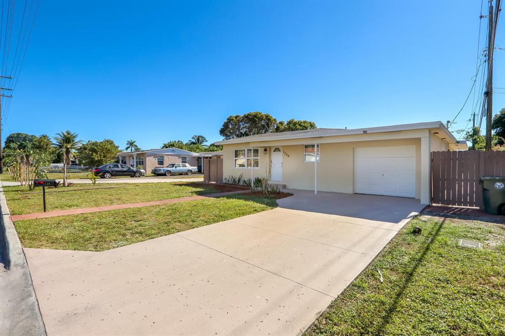 Beautifully renovated 3/2 with a 1 car garage in Lake Worth Beach! New roof, new A/C, impact windows - the list goes on. Large, fully fenced yard with no HOA. Schedule your showing today!