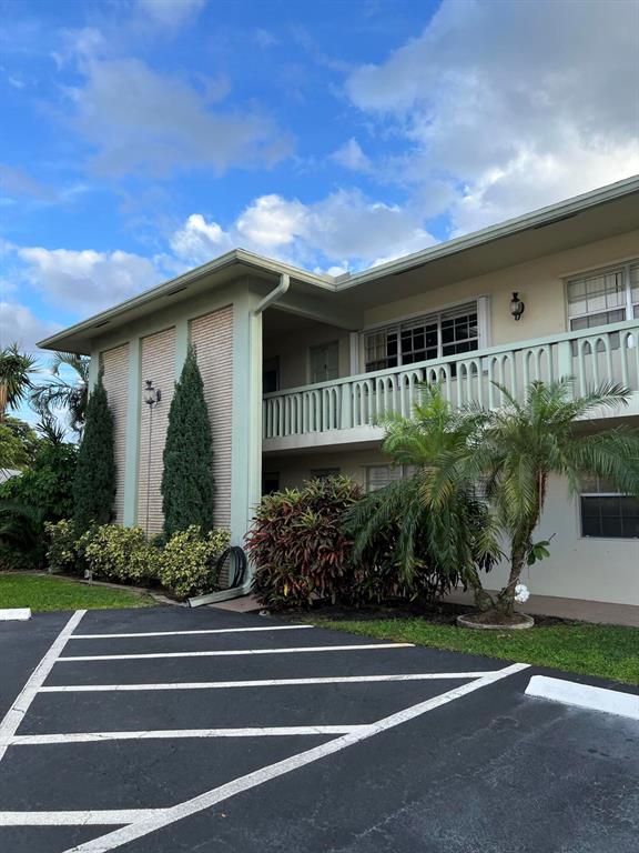 Bright, immaculate second floor condo in wonderful quiet community * Newer A/C and Water Heater *updated baths * beautiful wood floors in both bedrooms. 2 Community Pools. Laundry room on each floor. Walking distance to Publix, shops and restaurants close to the beachAll ages welcome * No Rentals * No dogs*One cat allowed * Seller would like to close at the end of March.Unit offered fully furnished for the convenience of the seller.