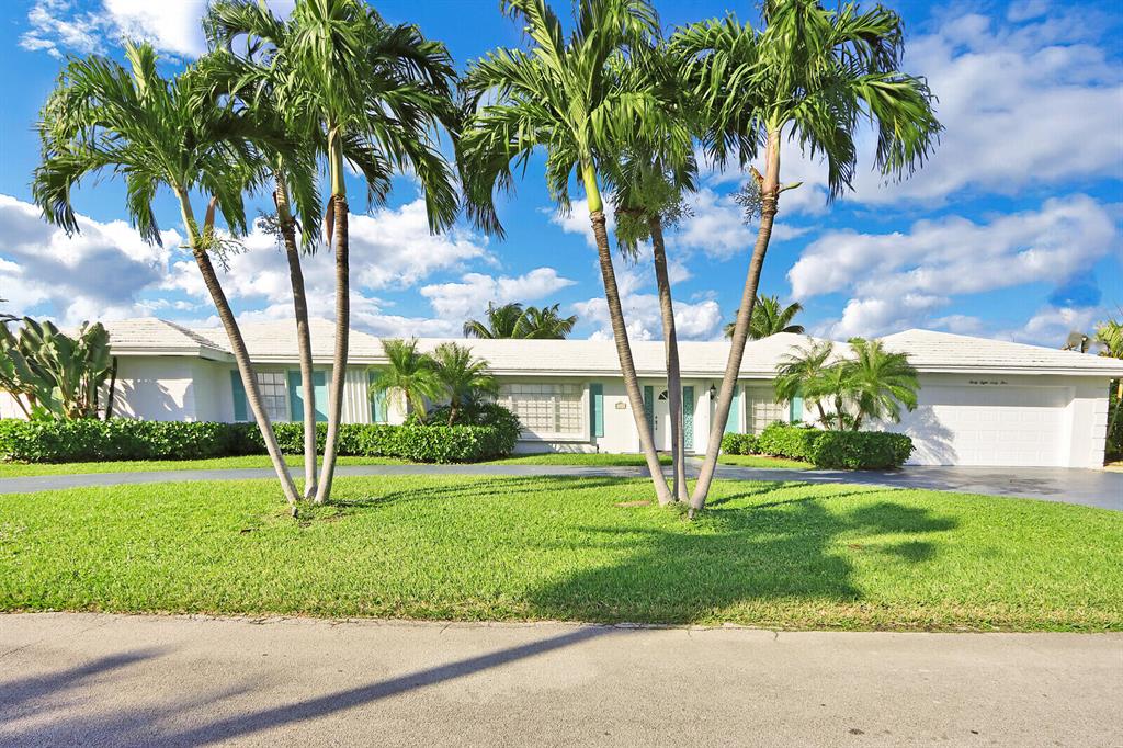 This lovely 3 BR 2 BA 2 CG Waterfront home offers 68' of water frontage on a deep water canal with water views from every room in the home.  Less than two minutes from the Intracoastal Waterway, no fixed bridges and a five minute walk to the neighborhood's deeded walkway leading to Singer Island's beautiful beach this is the perfect place to call home.Enjoy fabulous sunsets every evening from the comfort of your spacious screened patio with pool.  Bright and sunny, tile throughout, large master suite offering spacious walk in closet, separate room can be office, workout room or used to expand existing space.  This home has been well maintained throughout the years.  Singer Island is still one of Florida's best kept secrets.... don't miss this opportunity.