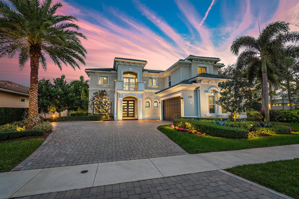 Beautifully appointed waterfront modern (Toll Brothers Carina Model) home in Jupiter Country Club with 5 bedroom 5.5 bathrooms.  Intermediate Golf Membership available with this home. (buy in required 17.5k  and 810 a month dues)