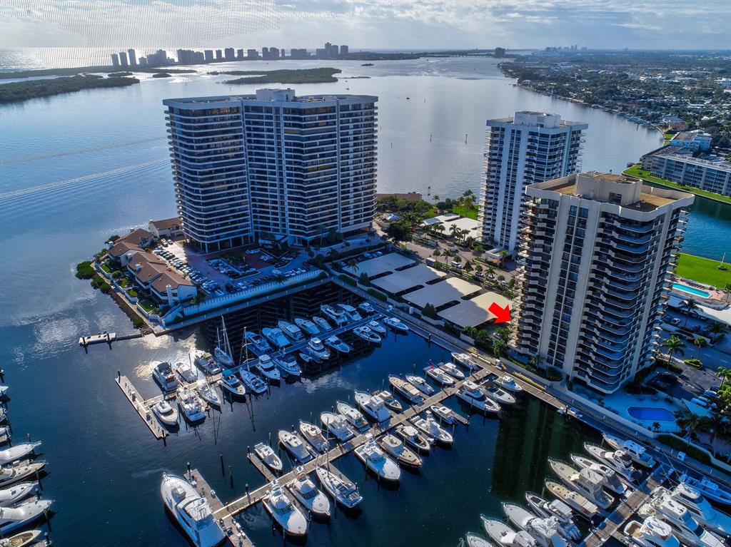 NO AGE RESTRICTION. Enjoy water views from every room w/ floor to ceiling sliders throughout this spacious 2 bed, 2 bath & den corner unit w/ HUGE wrap-around balcony. Light & bright with marina & Lake Worth Lagoon views. Large master suite w/ two walk-in closets & plantation shutters. Lots of closet space & large laundry room. Tiled living area, carpets in the bedrooms. FULL accordion shutters. Highly sought after Marina Tower building with no age restrictions and one small (under 25 lbs) pet permitted. Newly renovated building lobby, elevators & hallways Full time building manager on site. Amenities include, pool, spa, BBQ area & social room. Enjoy Old Port Cove with 24/7 manned gate, 1 mile intracoastal walkway, on-site marina and Belle's restaurant. No lease first 2 years. Water views from every room w/ floor to ceiling sliders throughout and all protected by FULL accordion shutters. This spacious 2 bed, 2 bath &amp; den corner unit w/ wrap-around balcony looks out over the marina, Lake Worth Lagoon and Macarthur Park. Large master suite w/ two walk-in closets &amp; plantation shutters. Lots of closet space and a large utility-laundry room make for that extra bit of space. ENORMOUS balcony is a perfect spot to sit and take in the view. All in the sought after Marina Tower inside OPC with no age restrictions and a small (under 25 lbs) pet permitted.

A newly renovated building lobby, elevators &amp; hallways, balconies and sprinkler system that is all PAID for and a full time building manager on site. Amenities include security, covered parking, a heated pool and Jacuzzi with a BBQ area, social room and generator. First class building with all the work DONE. 

Enjoy Old Port Cove behind a 24/7 manned gate, 1 mile intracoastal walkway, on-site marina and Belle's restaurant. Close to restaurants, shopping, NPB Country Club Golf, tennis and restaurant, white sand beaches and PBI Airport 20 minutes away. No lease first 2 years. Fee includes, common areas, security gate, basic cable, internet, water and sewer.

