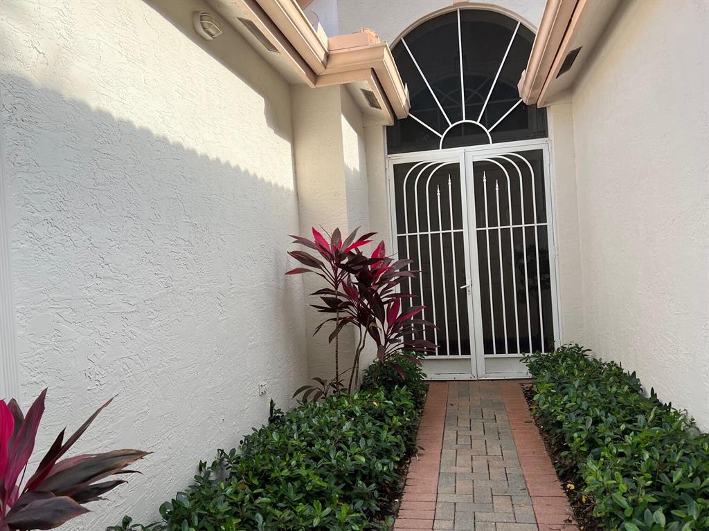 HUGE 4 BED WITH LAKEVIEW.  (ALTHOUGH 4TH BED HAS A CLOSET, IT IS USED AS AN OFFICE.) KITCHEN (2018) WITH QUARTZ COUNTERS & STAINLESS -STEEL APPLIANCES.   HURRICANE SHUTTERS THRUOUT.  LUXURY VINYL FLOORING THRUOUT. HOUSE PAINTED IN 2018.  HWTR 2014.   A/C - 2014.  CENTRAL VAC.  'SAFE STEP' WALK-IN TUB IN MASTER BATH - 2018.  LIGHT & BRIGHT.  HIGH CEILINGS. SOME FURNITURE TO BE SOLD SEPARATELY.$1729 CAPITAL CONTRIBUTION BY BUYER AT CLOSING.  $300 ANNUAL CAFE CARD.SQ. FOOTAGE & DIMENSIONS ARE APPROX. AND NOT GUARANTEED.  COMMUNITY HAS CLUBHOUSE, 2 POOLS, TENNIS, PICKLEBALL & ON-SITE CAFE RUN BY FLAKOWITZ.  CLOSE TO SHOPPING, ENTERTAINMENT, RESTAURANTS & BEACHES.  THIS LOVELY HOME WITH GREAT POTENTIAL AND IS NOT TO BE MISSED!
