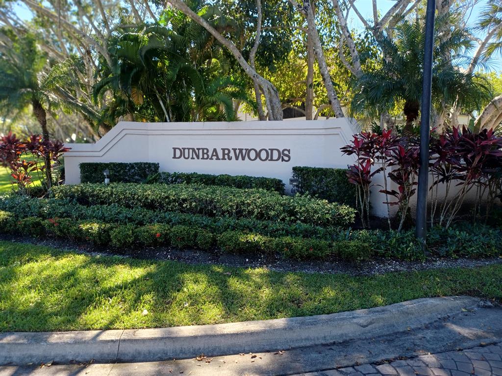 Come home to this beautifully maintained first floor 2/2 condo in the serene setting of Dunbar Woods located within the prestigious PGA National Golf Club community. The classic architecture of this condo and its manicured lawns and lush landscaping, create a warm and inviting environment. Within the pet-friendly Dunbar Woods community, residents have access to a private swimming pool and 24/7 security. For more activities, a fishing dock, pavilions, walking trails, basketball courts, softball fields, and children's playground are within walking distance of Dunbar Woods and the 35-acre PGA National Park. PGA National where the Honda Classic is played and a resort with beautiful clubhouse, spa, sitting within championship golf courses Close to all shopping, restaurants, specialty shops of