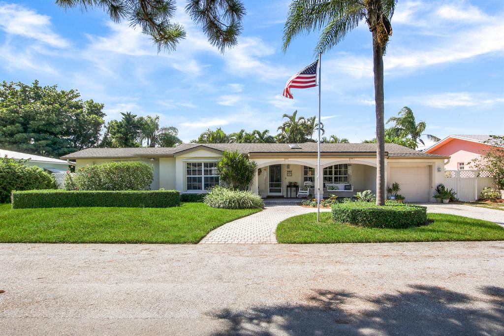 Own a piece of paradise in Juno Beach (8000+ sq. ft. lot)! Just minutes to the Atlantic Ocean, this single-story home has been remodeled by the owner who was a custom home builder. Move right in or add a 2nd level to capture the grand views of paradise (currently a 2nd level deck). Many upgrades in this home include (but are not limited to) remodeled kitchen with granite counters, custom cabinetry, eat-in breakfast nook, hardwood floors, hurricane panels, completely renovated master bath with walk-in closet & French doors to the open patio. The backyard is an oasis to enjoy the beautiful landscaping, butterfly gardens, open patio or just relax on the roof top deck. Minutes to I-95, Florida Turnpike, beaches, schools, restaurants and shopping  SELLER VERY MOTIVATED.