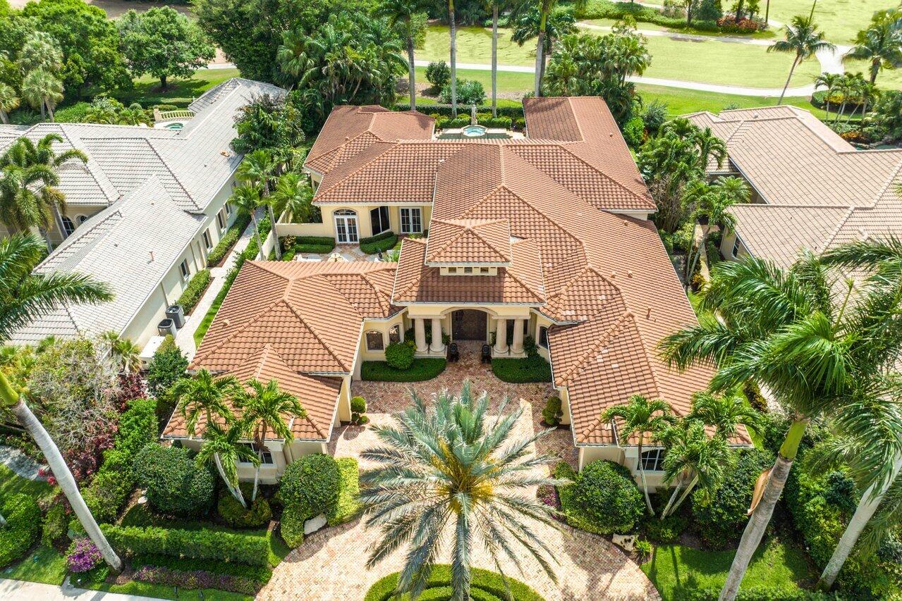 Spectacular Estate Home in desirable Ballenisles Golf Club in the exclusive enclave of Grand Pointe! This one of a kind home boasts 5 bedrooms, 6.2 baths, 3.5 car garage, office/den, including a sought after guest home and so much more. As you walk through the custom gates you will be enamored by the beauty of your private spacious courtyard with soothing sounds of the fountain. Once you enter the spacious foyer you will be amazed by the architectural detail and custom finishes throughout this stunning property. The custom wine closet is the perfect addition to the luxurious dining room. Relax in the expansive Primary Suite where you are surrounded by stunning views of your backyard oasis. The space also offers a grand sitting area, his/her fitted closets, and unique architectural detailing. The backyard is an entertainers dream with golf course views, custom heated pool &amp; spa, tranquil water features, and lush landscaped gardens. Other features include newer roof, wet bar, built in grill, Armor screen protection, and much more! Call for your private tour today!
