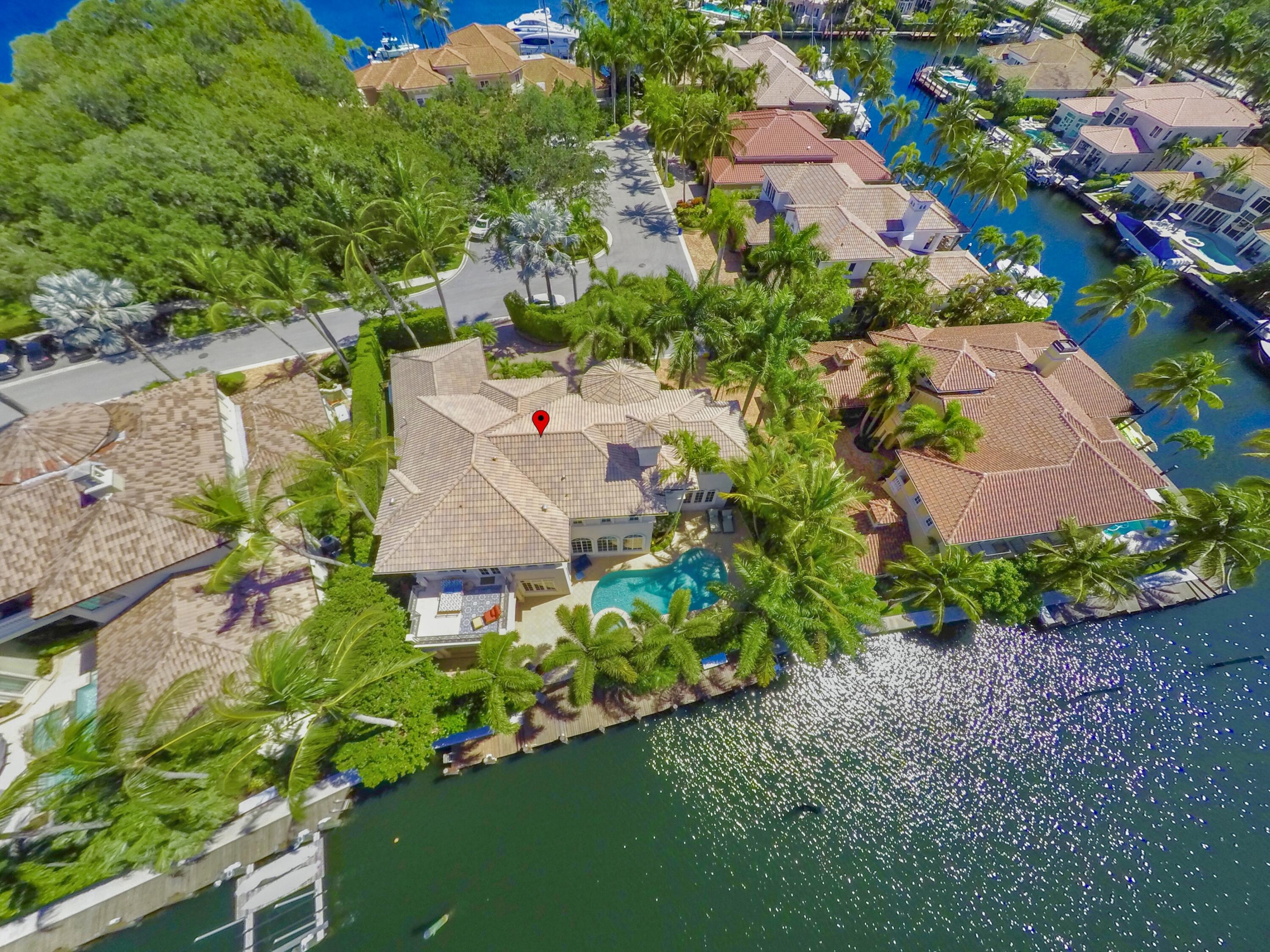 Prestigious Harbour Isles, a manned gated 24/7 waterfront community sits along the Intracoastal & NPB waterway, your passageway to Atlantic Ocean.  93' waterfront, 75' dock w/jet ski lift/water/electric, and heated saltwater pool & spa.  Precision detailing throughout.  Incredible Primary Suite is amazing w/Open Water Views from large balcony, huge walk-in closet w/2nd laundry, separate luxurious marble, his and her full baths.  This perfect home boast 5 Ensuites, 6 1/2 baths, marble travertine floors, elevator, 3-car garage w/oversized doors, 50KW generator, Giga fiber, Mature Palm Beach Design landscaping and 21 steps to Nature Preserve w/Gazebo.  From the moment you enter this home, it impresses you with grand architecture (Randall Stofft) & landscaped privacy. Will consider Bitcoin.
