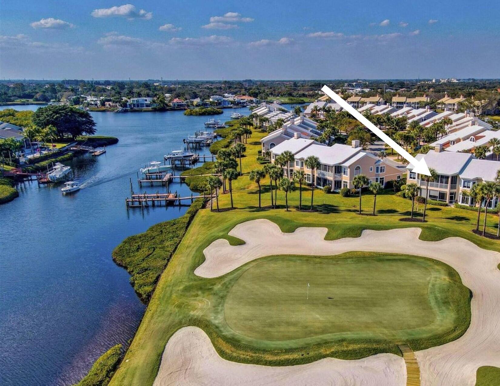 The BEST WATERFRONT & GOLF VIEWS with SE Exposure from this 2 bedroom, 2470 AC sq ft Harbor home with private dock in Admirals Cove. This is a RARE/PREMIER LOCATION within Admirals Cove, just STEPS AWAY from THE CLUB and all the amenities!   This harbor home is one of the largest floor plans to include AC screen room.  It's all light and bright with open floor concept with beautiful views from every room.   This residence features volume ceilings, white wood cabinets, new quartz counters, SS appliances, renovated bathrooms, new fixtures, and ceramic gray tile throughout living area.  Other features include expansive balcony overlooking the water and golf views, private elevator, oversize 1.5 car garage and the home is in excellent condition. The den is opened to the main living room, but it can be converted to a 3rd bedroom. The private dock with lift directly behind the home will accommodate up to 35' vessel.
Required golf membership purchase conveys all the first-class amenities of Admirals Cove including two spectacular clubhouses, 45 holes of golf, 5 restaurants, 58 slip marina with floating docks, Yacht Club, tennis courts, pickleball courts, state of the art fitness and wellness, 21,000 sq ft brand new spa &amp; salon, Covesters kids club and Platinum service.
