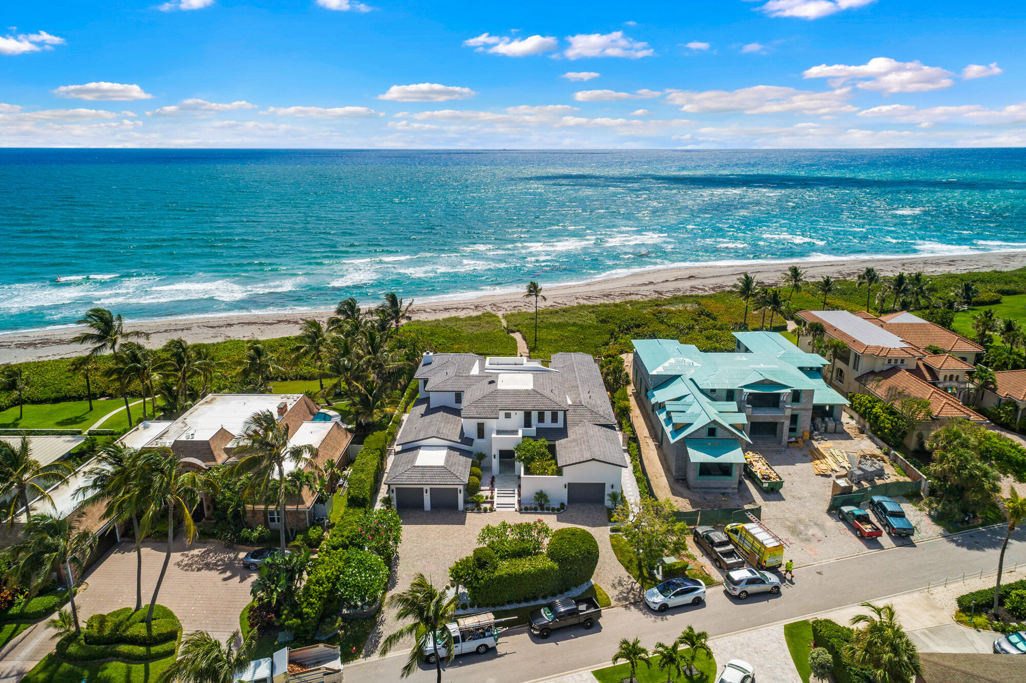 Unobstructed panoramic views of the turquoise Atlantic Ocean from this 8,600 total sf home with 5 bedrooms and 5.5 bathrooms. Constructed in 2011 and recently updated, the home is situated on one of the highest elevated lots on the ocean in south Florida! Panoramic ocean views and great views of the Jupiter Inlet everywhere from the expansive downstairs master suite, oversized kitchen, all living areas and guest bedrooms. The recently updated kitchen opens to the living area spacious covered patio. All new beautiful outdoor stone pavers and renovated pool area that overlooks the turquoise blue waters of the Atlantic! Other features include newly updated landscaping, impact windows and doors, elevator, large balcony overlooking the ocean, rooftop terrace looking down on the ocean and back concrete block and poured concrete and steel construction, and a very attractive home inside and out! Located in Jupiter Inlet Colony on the southern tip of Jupiter Island, this premier oceanfront location is close to everything, but secure in one of the safest towns in America. The community has a marina and yacht club available as well.