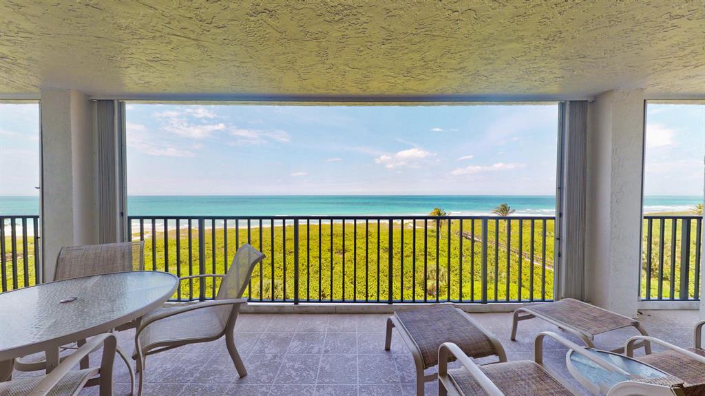 Opportunity waiting for YOU! Amazing oceanfront views! Middle unit with 2 bedrooms facing the ocean & biggest balcony. Enclosed garage-port. Gated & active community with all the amenities you could want. Call me today for a private viewing!