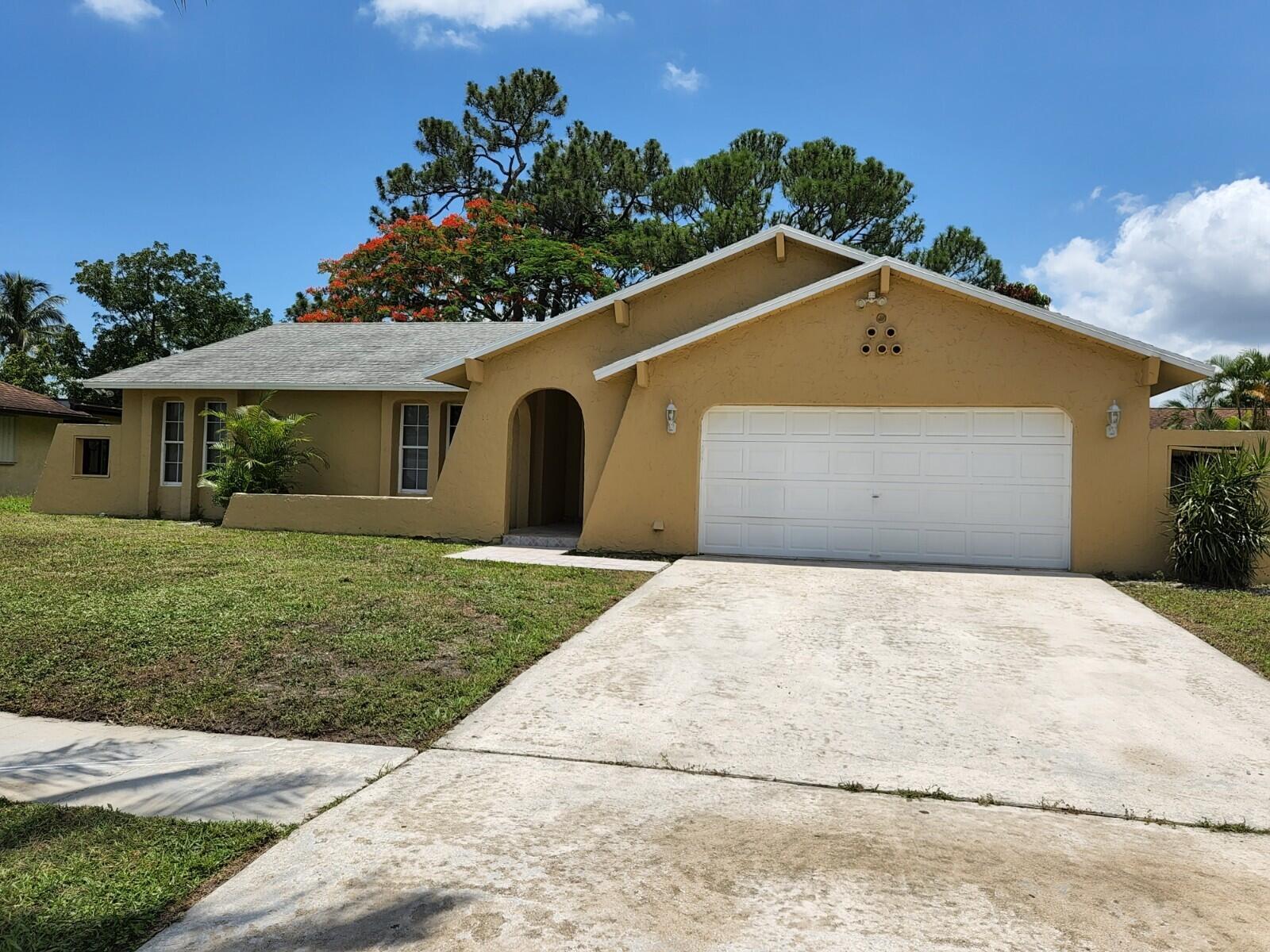 Photo 1 of 1486 N Woodcrest Road in West Palm Beach - MLS R10810509