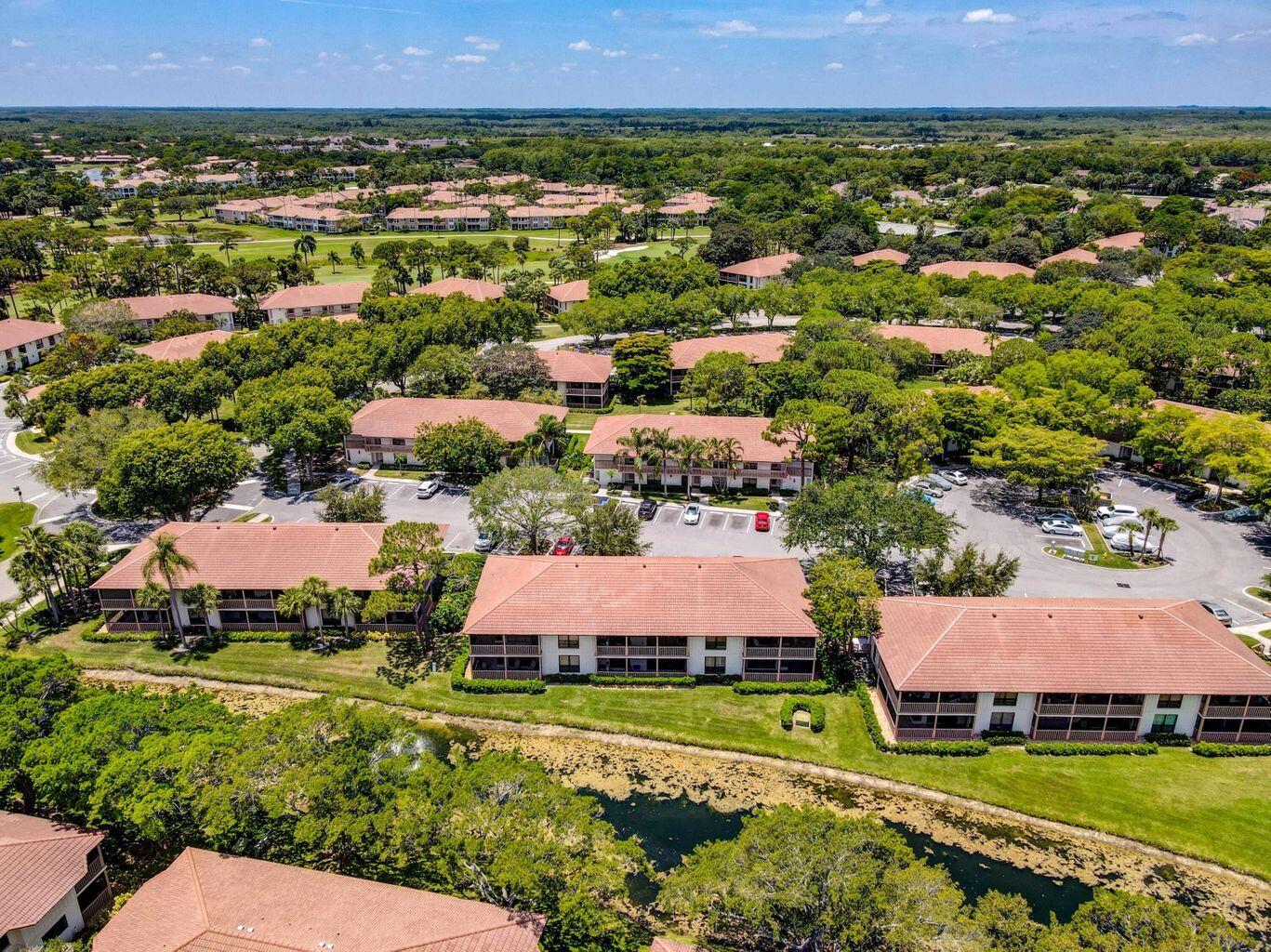 Ideal location, first floor end unit, canal view in the Golf Villas.  This unit was well cared for by the long time owner, but it is in need of updating.  Wrap around, covered and screened patio overlooks a serene canal with fountain.  Close to community pool and walking distance to the hotel and spa.
