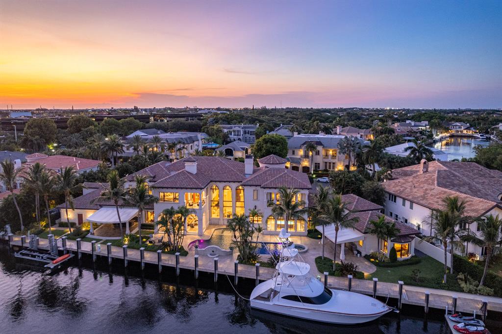 With its show-stopping blend of Old World architectural marvels and modern-era splendor, the famed Nero Estate stands alone as a true residential original in South Florida. The Sanctuary, a private enclave of luxury estates along the Intracoastal in Boca Raton, provides the exclusive backdrop for this 15,856-square-foot masterpiece, nestled on a coveted lot with 258 feet of water frontage. The seven-bedroom, eight-bath (with three half-baths) double-lot property, brimming with rare artisanal details, finds inspiration everywhere from Western Asia to Europe to the Windy City.The design drama begins in the grand rotunda, an entrance that includes a 12-foot-tall antique, handcrafted wood door. Elements in the kitchen (the four-sided dome over the breakfast nook) and in the central galley (barrel-vaulted design with hand-carved stone detailing) recall ceiling treatments prevalent in Renaissance-era Italy. Antique wood inlays and leather-padded ceiling beams in the study speak to Tuscan influences that resonate throughout the home. Striking precision-cut travertine tiles adorn the lower level, while upper-level bedrooms boast flooring manufactured from reclaimed hardwood that's more than 150 years old. Reclaimed antique wood treads, meanwhile, add to the majesty of a grand staircase designed with imported Italian marble. Inspiration closer to home comes in the form of Chicago brick pavers in the charming, Euro-style wine cellar with custom-crafted lighting (another consistent feature in room after room).

For all of its historical details and global sourcing, the Nero Estate also checks more than its share of contemporary amenities. An all-encompassing Crestron system gives the home a completely different feel at night, casting the property in dramatic shades thanks to state-of-the-art interior and exterior LED lights. The cinema-style theater with customized leather recliners and cutting-edge acoustics blends the worlds of comfort and technology to produce the ultimate immersive atmosphere. 

Luxury amenities cover transportation by land or by sea. Automobile aficionados will appreciate the mammoth garage, large enough to accommodate 14 cars. Boating enthusiasts have access to a high-tech lift, capable of hoisting a 50-foot yacht&#x14;part of a dock that stretches some 250 feet along the Intracoastal. A resort-style pool and spa, exquisite landscaping, a firepit, and sprawling entertaining areas add to the outdoor experience.

The Nero Estate is history in the making&#x14;and so much more.
