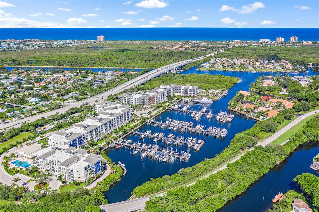 Built in 2018 Azure offers the finest of full concierge services from a boutique community. Enjoy sunrise & sunsets from the nearly 3,000 sqft wrap around balcony with direct marina views just moments from intracoastal and Juno's blue water sandy beaches. Unpack your bags & step from your privately keyed elevator to an open floor plan with natural sunlight & panoramic views from nearly every room. This move in ready turn-key 4 bedroom en-suite home has his/her master baths, secondary master, 3 indoor parking spaces with electric options. First class amenities just minutes from Palm Beach & Jupiter Island. Azure's concierge has 24/7 manned gate, fitness centers, lap/heated pool & spa, sauna, private climate-controlled wine room, putting green & potential boat slip availability.