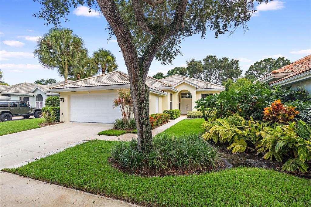 Meticulously maintained 3BD/2BA/2 car garage Divosta built home located in the heart of Jupiter. ''A'' rated schools and conveniently located close to I95, the turnpike, beaches and shopping. This home has been completely updated with custom closets and tile flooring throughout. The kitchen features beautiful custom cabinetry, quartz countertops and S/S appliances (2019). Bathrooms and laundry room also recently renovated. The spacious and bright living room/family room has been updated with crown molding and lots of recessed lighting. 16 Seer A/C (2019) with a smart thermostat, Barrel tile roof and skylights redone (2014).  PGT impact slider installed (2019). No Polybutylene pipes. Security camera system outside and inside audio system does Not convey. This home is a must see!