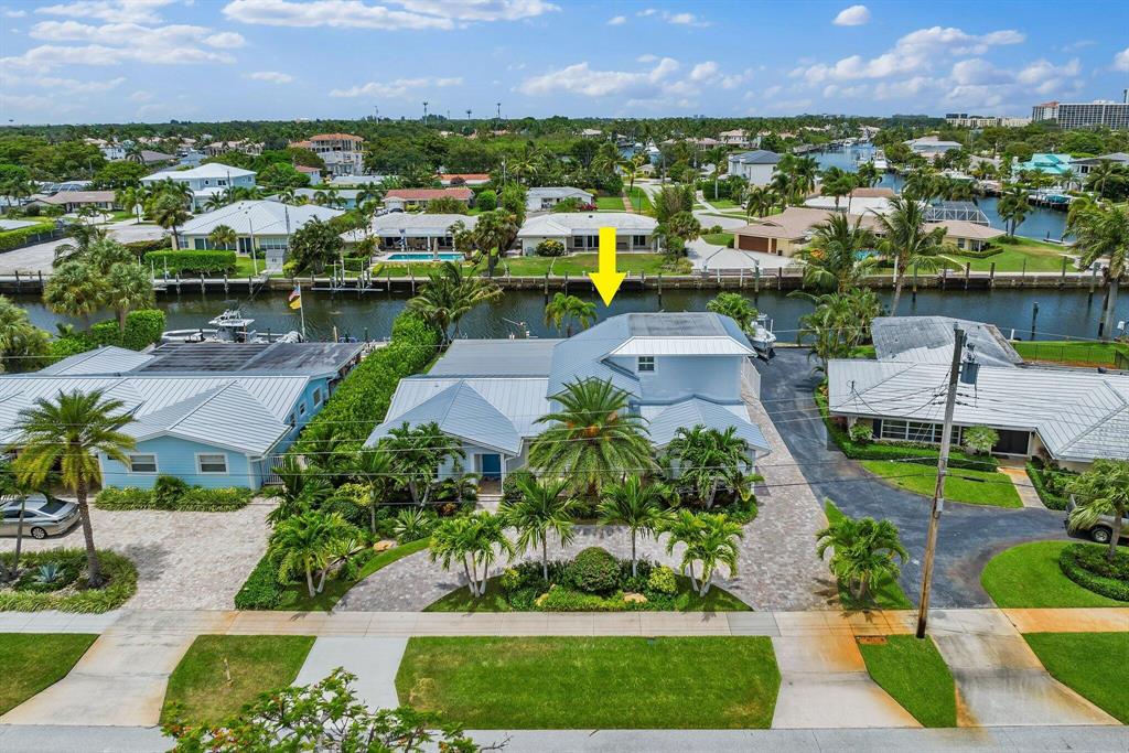 Totally Renovated Deepwater Home on 100' Wide Canal with Private Dockage for up to 70' Boat. No Fixed Bridges & Easy Access to the Intracoastal & Ocean. This Key West Style Home has 3 Bedrooms, 3 Baths & 2 Car Garage. Features include New Metal Roof, Impact Windows & Doors, Plantation Shutters, Wood Plank Tile, Circular Paver Driveway, Hurricane Screened-In Patio & Lush Tropical Landscaping. Open Kitchen with Custom Shaker Cabinets, SS Appliances, Pantry, Beautiful Quartz Countertops, Oversized Island & Backsplash. 1st Floor Spacious Master Suite with Sitting Room & Huge Walk-In Closet. Master Bath with Custom Double Sink Vanity, Large Shower with Quartz Walls, Dual Shower Heads & Frameless Glass.1st Floor Ensuite Guest Rm & 2nd Floor Master Ensuite (Used For Office/Den) with Large Balcony Overlooking the Water. Both Have Been Updated with Quartz Vanities &amp; Frameless Glass Shower. 2 Panel Shaker Wood Doors with Brushed Nickel Hardware Throughout. Oversized Back Patio with Hurricane Screens, Additional Floating Dock for Jet Skis &amp; Paddleboards. Tons of Parking!  North Palm Beach Country Club features a Jack Nicklaus Signature Golf Course, Olympic Pool, Tennis &amp; Newer Clubhouse(No Membership Fee is Required). Truly a Dream Location for Boat Lovers! Come Experience the Florida Lifestyle.