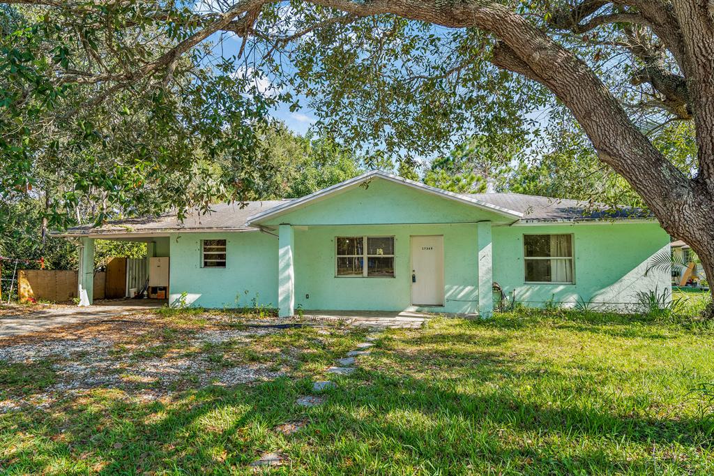 Spacious 3Bed/2Bath Single Family home in the community of Jupiter Estates with NO HOA. Large indoor utility/laundry room and Carport. Big corner Lot with fenced backyard.  Close to Turnpike, I95, shopping centers, A rated schools and beaches. Great Opportunity for homeowners and investors.