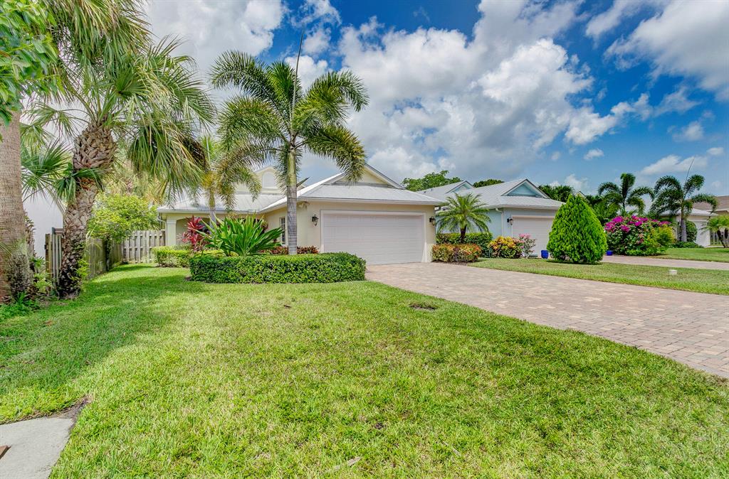 Beautiful 4 bedroom/2 bath/2 car garage,  CBS home located in the heart of Jupiter with no HOA.  Built in 2016 this home features a metal roof, full impact windows and a spacious fenced in yard with an above ground pool.    The interior of this split bedroom floorplan features tile floors, crown molding, granite countertops, stainless steel appliances, tile backsplash and more.   The master suite features a spa like bathroom with dual vanities, a large glass enclosed shower and a pedestal tub.  There are impact sliding glass doors off the family room and master suite that lead to your covered lanai and extended patio which is a great spot to entertain and enjoy the South Florida lifestyle.