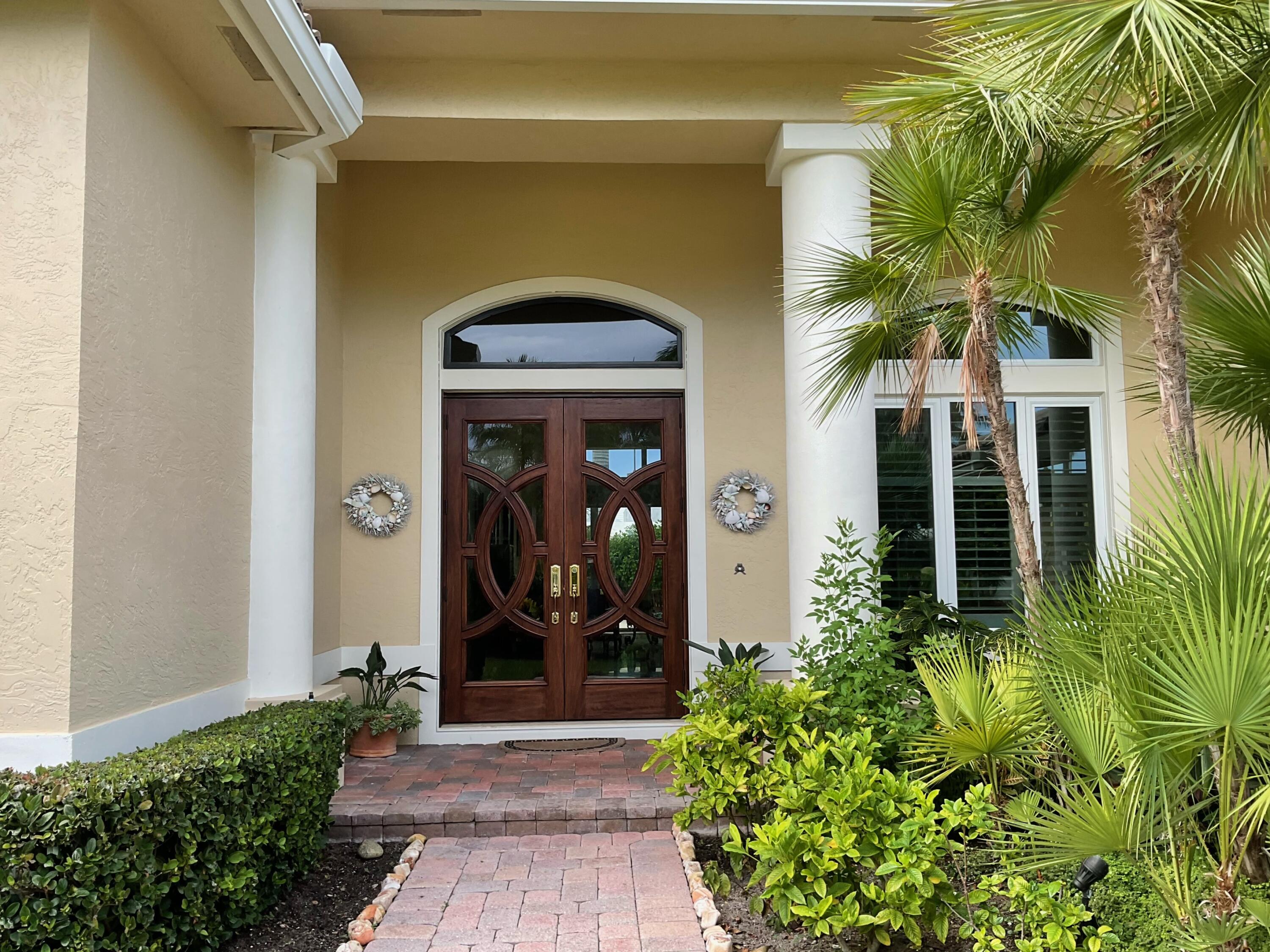 Call this pristine gem your home in much sought-after Jupiter Inlet Colony.This 3 or 4 Bedroom, 4 Bathroom home was significantly remodeled. Featuring 14 ft ceilings w triple crown moldings, oversized Master Bedroom overlooking pool & patio, large updated Master Bath, a wood paneled office, updated kitchen with quartz countertops, family room w bookshelves and surround sound leading out to patio and pool - perfect for entertaining friends and family.  The second floor features two large bedrooms plus loft and 2 full baths. Deeded Beach Access with entrance to the beach only steps away.  Updates include: New Roof, Impact Windows & Doors installed in 2021. Kitchen & Bath renovated in 2022. Outdoor living area & heated pool renovated in 2019. Membership available to Jupiter Inlet Beach Club