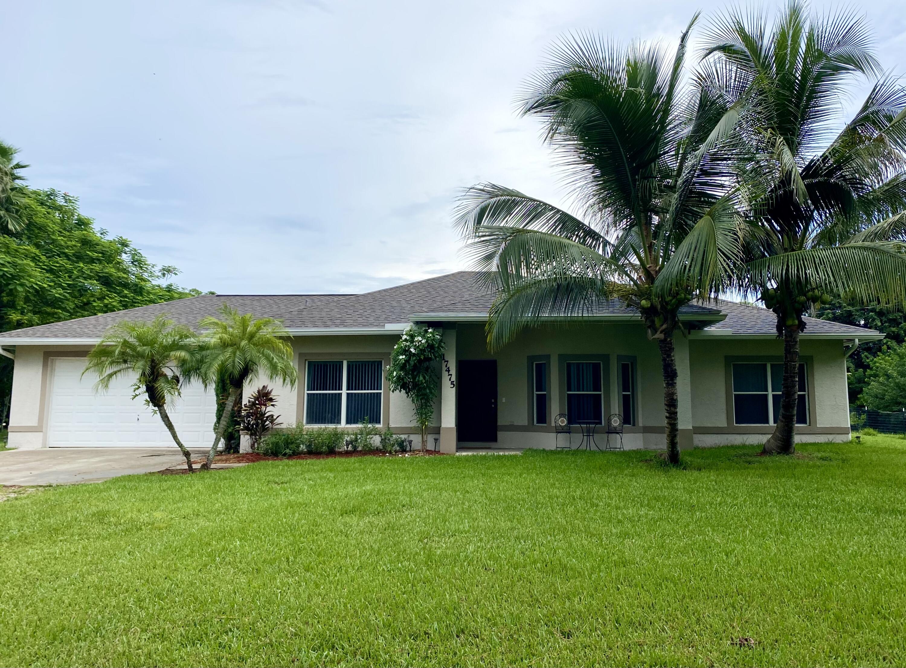 Have it all with this CBS 3 bed 2 bath 2 car Garage POOL home with a 3 STALL Horse Barn (water & electric) on a beautiful flat high & dry 1.4 Acre corner lot in Loxahatchee. Open Floor Plan, High Volume Ceilings, 2020 Roof, 2022 AC, 2022 Complete LVP Flooring with zero transitions, 2022 Updated Master Bathroom. Property has two driveways to accommodate large horse trailers, boats, RV's. Completely fenced and on a paved road. Minutes away from some of the best equestrian trails and parks in the area, shopping, & dining.
