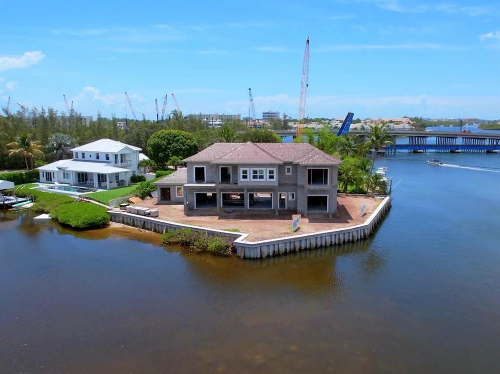 This is your chance to own a luxurious waterfront property in Jupiter, Florida, currently under construction and located off the picturesque Jupiter Inlet. This stunning 2-story, West Indies-inspired CBS construction home will sit on a .58-acre land and will offer an impressive 265' of aqua-blue water frontage with unobstructed views across the Loxahatchee River. The house will be built using only the finest materials, featuring icynene insulation and high-impact glass windows, ensuring the safety and comfort of its residents. The energy-efficient house is set to be completed by October 2023.Jupiter, Florida is known for its sandy beaches, thriving art scene, eclectic cuisine, and vibrant nightlife. The town has a population of over 65,000 and offers something for everyone, including
