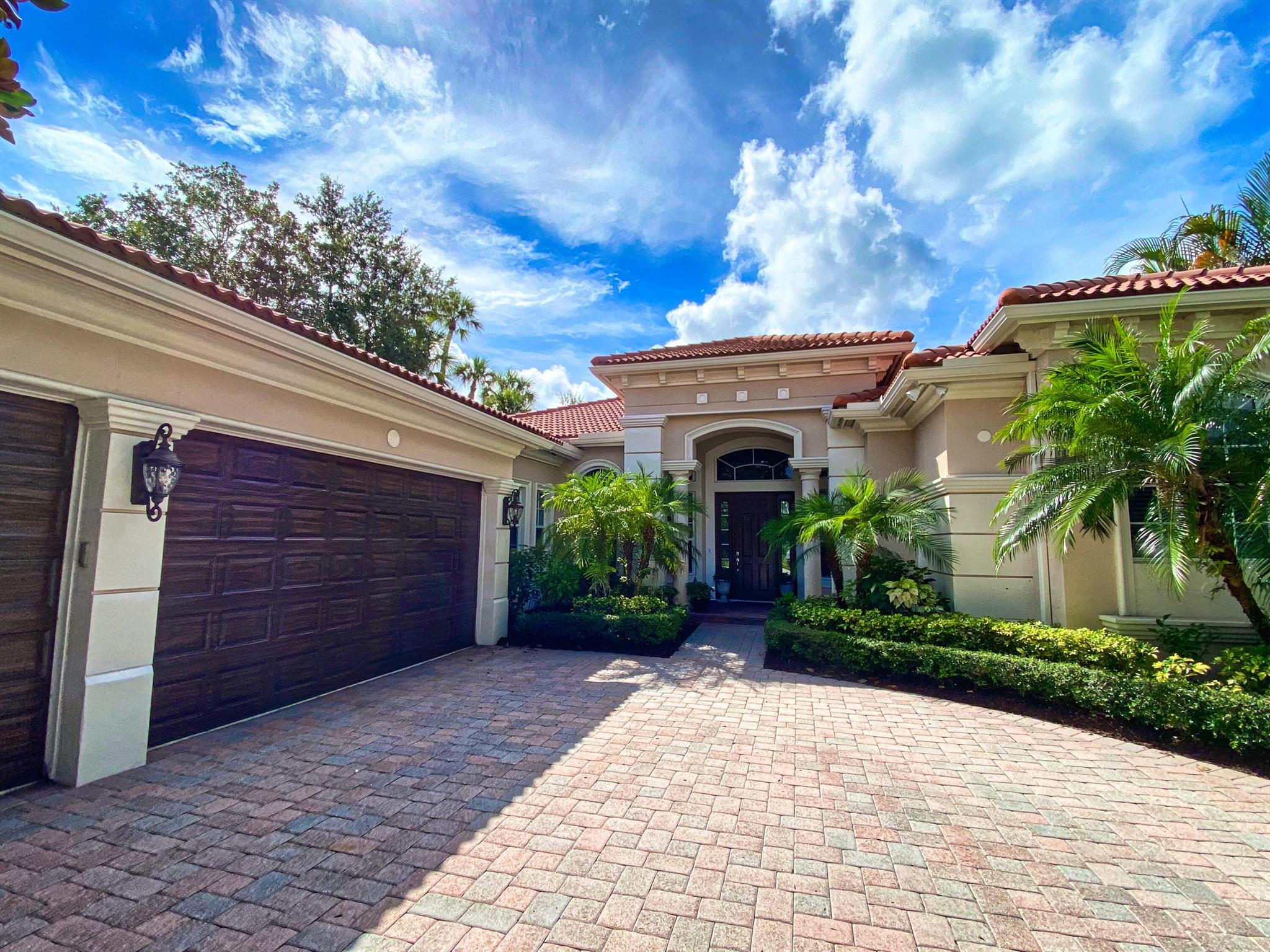 From the moment you open the front door, you'll be greeted by breathtaking scene of sun- soaked palm trees, lush tropical foliage, and a long-water view to the 16th tee of the signature Greg Norman course at JUPITER COUNTRY CLUB. whether a winter retreat or permanent residence in the city Golf Digest calls the capital of professional golf, this 4BEd/4Bath Single Level Pool Home on a private corner lot, has everything you need to live, work and play in this South Florida paradise, including : separate Den, Family, Living & Dining Rooms (all with Poll/Lake & Golf Course Views), a Large Master Suite with Spa-Like Bath, ensuite 2nd/3rd/4th Bedrooms with walk-in Closets.(SEE SUPPLEMENT REMARKS ) A private, spacious lanai, with pool, spa, and long lake views add a timeless resort feel that will continue to captivate you for many years to come. Amenities at Jupiter CC include golf, tennis, fitness/spa, and 2 dining venues. And with no need to wait 2-3 years for a golf membership, you can play golf and enjoy the club amenities immediately with a golf membership available for purchase. (Intermediate Golf Membership Fee of $37,000 + Tax with monthly dues of $925 + Tax)
