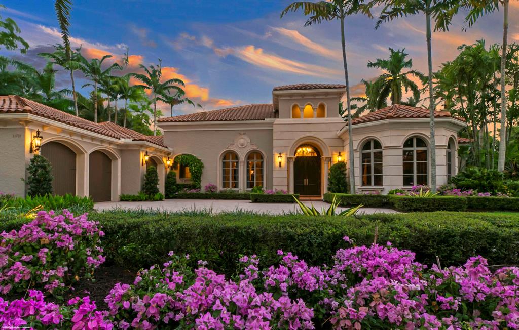 Elegantly stated Castillo floor plan on one of the most coveted streets within Old Palm Golf Club.  This private enclave faces a beautiful nature preserve, and boasts lush landscaping; a private, tropical water feature view; expansive covered lanai with Pecky Cypress ceilings, breezy awnings, new summer kitchen including ice maker, beverage center, BBQ grill, gas burner, and sink; bathe outdoors under the stars in the custom teak shower with bench and light; the custom heated pool & spa is a great place to relax and unwind.  Custom double front doors invite you into the home featuring marble floors, volume ceilings with lots of details throughout, crown moldings and rich appointments. Grab a cocktail with friends at the custom wet bar with gorgeous Onxy tops; host a dinner party in the formal dining room with butler pantry and wine storage. Gather with family and friends in the casual family room which is open to the kitchen and accessible to the pristinely manicured backyard.  When the party is over retreat to the Master Suite with lavish bathroom, his and her vanities, spacious shower, jetted tub, his &amp; her water closets and ample closet space with custom built ins.  Spoil guests in the guest suites featuring private bathrooms and access to the palm tree lined courtyard. The full 3 car garage with custom built in storage will keep tools and cleaning items neatly tucked away.  
Other features: 48 kw generator, paver walkways on both sides of the house, new roof (2022), updated wallpaper throughout, new Onyx tops, new leather finish tops in the kitchen, custom hood over the cooktop, lots of upgrades!