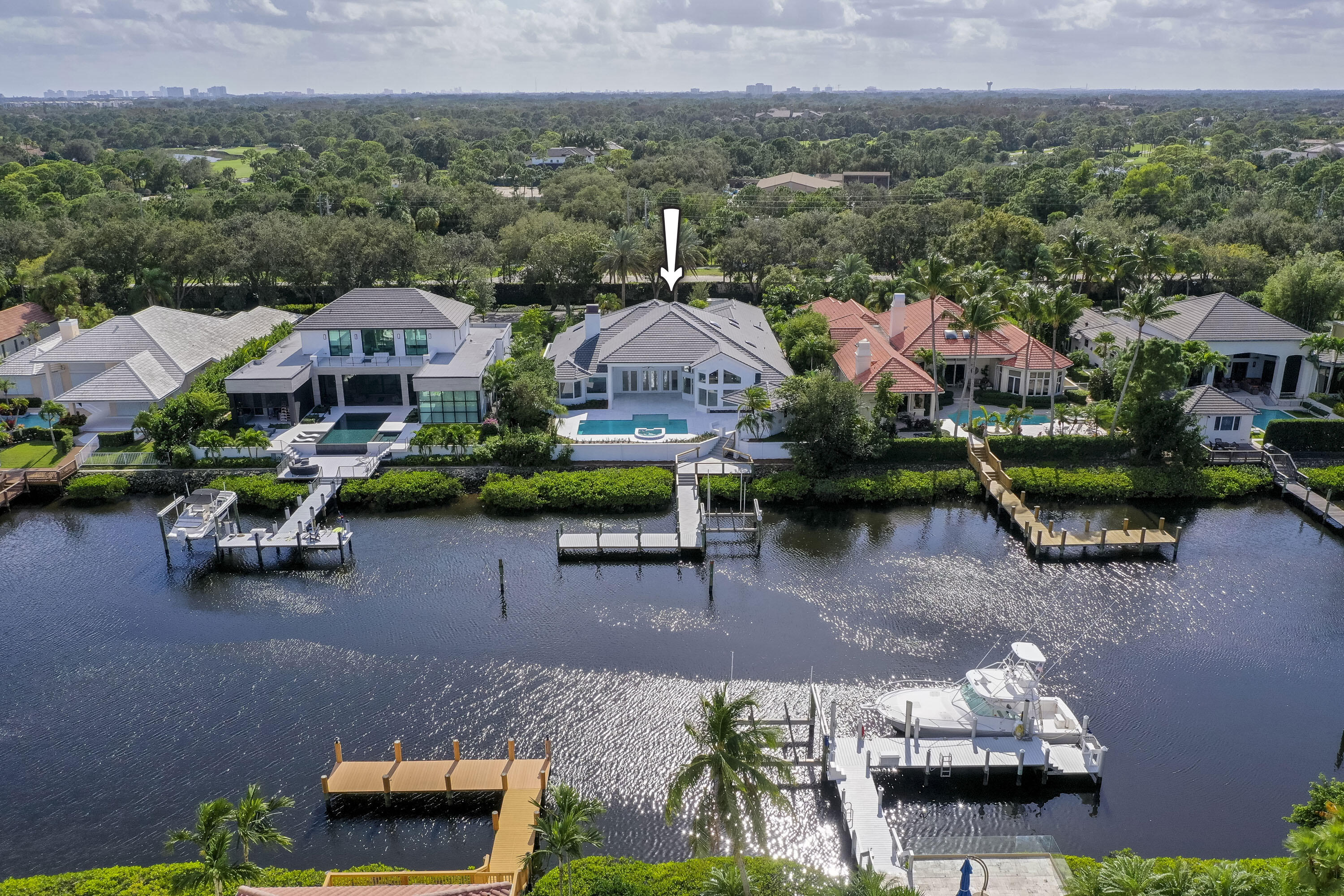 Spectacular total renovation, 100% of the exterior & interiors are brand new. 4660 sq. ft., 4 bedrooms, 5.1 Baths, Everything is new including roof, landscaping, driveway, pool, kitchen, counter tops, all baths, bar, windows, doors & fixtures.