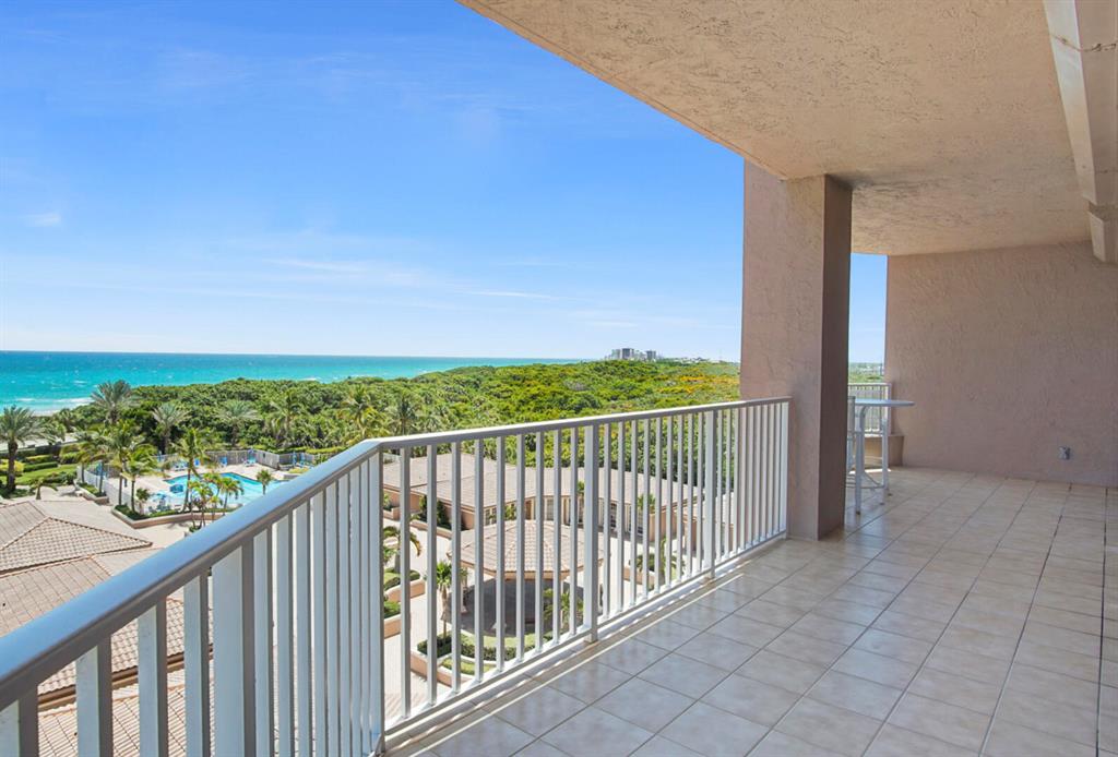 Location, location! No expense spared and pristine condition best describe this one of a kind corner unit in Juno Beach's Ocean Royale. Rare and hard to find ONE OWNER, 5th floor, corner unit boasts stunning ocean views, from private over sized wrap around balconies that include automated roll down shutters. Gorgeous 3 bedroom 3.5 bath home offers open concept, large and spacious bedrooms and master includes ensuite with extra large walk in closet with built in shelving. Home also includes large laundry room, abundant storage with multiple closets. Amenities include private elevator, private beach access, tennis cts, gym, concierge services, theater room,  ballroom, virtual golf cage, 24 hr security, billiards, library, resort style pool area and meticulously landscaped grounds. A Must see