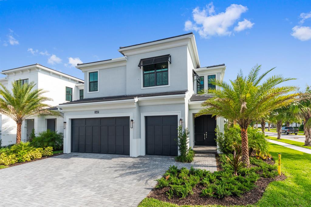 This Brand NEW CONSTRUCTION Single family home is in the highly desired gated community of Artistry at Palm Beach Gardens and is available for occupancy today and can close in 2022!  Best location in Artistry, on a premier corner lot, this ''Hudson'' upgraded floor plan home features 3,577 AC sq ft, 5 bedrooms, 4 bath, 3 car garage and bright and spacious open floor plan. The gourmet kitchen is equipped with white and gray wood cabinets, designer quartz countertops, GE SS appliances include gas oven and upgraded hood.  The Kitchen is opened to the Dining and Family Room that gives you and your guests plenty of room to gather. The large Covered Lanai overlooks a beautifully shaded natural lush landscaping.  Perfect for a family, all bedrooms are conveniently located on the second floor .... surrounding a spacious Loft. A large master suite with dual sinks and free-standing soaking tub.  Custom California closets are being installed in 2 weeks.
The community of Artistry is in the heart of Palm Beach Gardens, only 3 miles from the Gardens Mall and Minutes from the best beaches: Jupiter and Juno Beach (Juno Pier).   The resident only clubhouse includes a fitness center, yoga studio, heated resort style pool and sport courts. Tons of green space for your family to enjoy, walking trails for you and your pets and plenty of outdoor areas to enjoy. Artistry is centrally located near PGA, near the best shopping and world class restaurants, as well as A rated schools around. This community and this home is in one of the premier locations in all of Palm Beach County!
