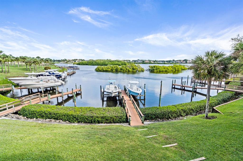 Fantastic long water view in this true 3 bedroom harbour home plus a den and boat lift with ocean access. The second floor unit has an elevator and high ceilings to enjoy the thrilling view .The windows are hurricane rated for your protection and enjoyment. This is an opportunity to take a fantastic unit and location and transform it into the home of your dreams. It is also located directly across from the community pool . The unit has a golf membership associated with it so you can enjoy Admirals 2 golf courses, 2 club houses, world class spa , magnificent fitness center, tennis and pickleball faculties and several dining options. Live in the best resort country club in South Florida with probably one of the best water views.