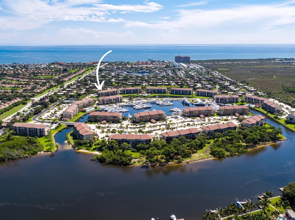Perfection in peace and serenity.   Excellent location in The Bluffs Marina which is perfectly placed on the Intracoastal Waterway, 0.8 miles from the beautiful blue Atlantic Ocean. Estate Sale of Original Owner...End unit so very lightly lived in a short walk to Jupiter Beach location in a community of lush tropical landscaping with winding sidewalks to Tennis Courts and 4 community pools within walking distance to a supermarket, pharmacy, restaurants, and more. Offers that true laid-back island feeling. Low condo fees and covers so much....