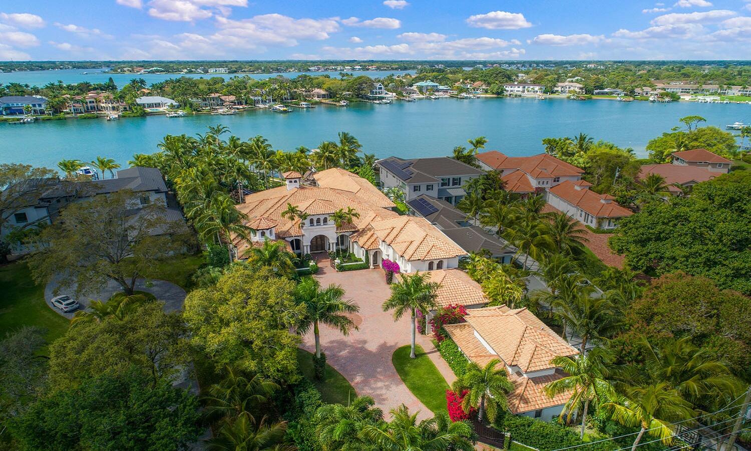Timeless Tuscan riverfront estate on an expansive 1-acre parcel with 190' of water frontage along the Loxahatchee River!  The recently renovated expansive home was built in 2003, updated and renovated over the last 2 years, and features over 13,000 total square feet, which includes the gracious main house that is all on 1 level except 1 guest bedroom suite, the spacious outdoor living areas, 6 car garage, and a 2 bedroom guesthouse with ultimate privacy and scenic serenity.  As you enter the gated driveway, you are taken in by the timeless elegance with modern functionality along with meticulous detail through the estate. This one of a kind compound features an open floor plan with very high ceilings, lots of detailed woodwork, newer Downsview kitchen, premier impact doors and windows throughout, oversized natural marble and spectacular views of the river, and the resort style pool and backyard.  The beautiful outdoor spaces include an incredible pool with a lazy river that meanders through the yard and cumulates with a grand water featuring water slide. Other outdoor living areas include many covered loggias, the basketball court that could be converted to pickleball, playground, tiki bar, dock with a slip that can accommodate up to a 50' yacht, and lush landscaping. The house comes equipped with a whole house generator, a smart house with Lutron automation. Spectacular location just minutes to the ocean by boat or car, in the heart of Jupiter along the premier waterfront, yet very private and secure.

Location! Location! Location!  Jupiter is known to be one of the premium spots to live in South Florida.  It has some of the best snorkeling &amp; fishing right in your backyard off the dock in the beautiful water behind the house. The area offers exceptional A-rated private and public schools, great restaurants that you can access via boat, car or walking &amp; proximity to world class shopping, best beaches and only 30 minutes away from PB international airport.