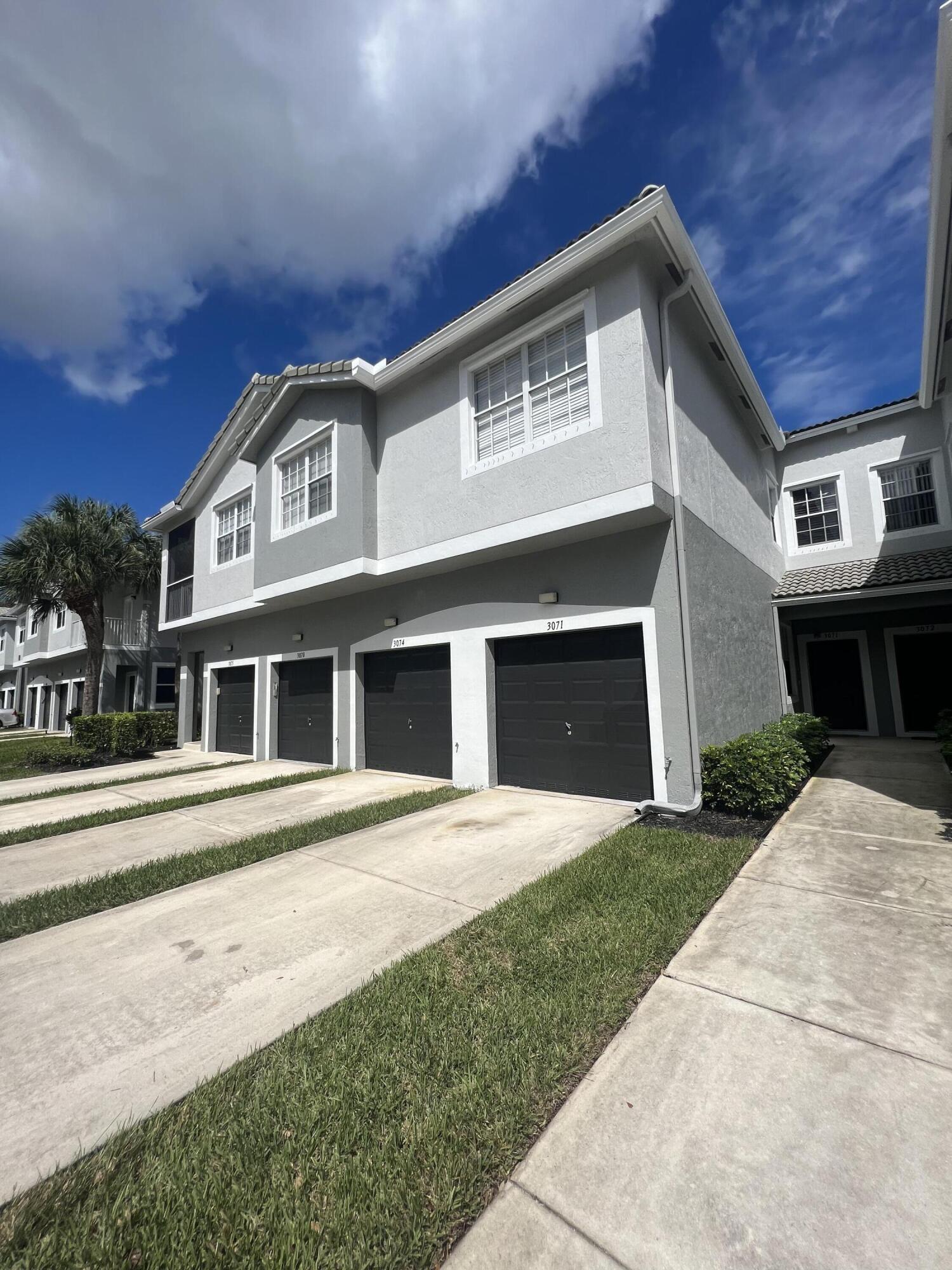 VERY NICE TOWNHOUSE IN GATED COMMUNITY. LOCATED IN THE HEART OF GREENACRES, UNIT COMES WITH MANY UPGRADES.  WATER AND ALARM MONITORING IS INCLUDED. unit is currently tenant occupied.