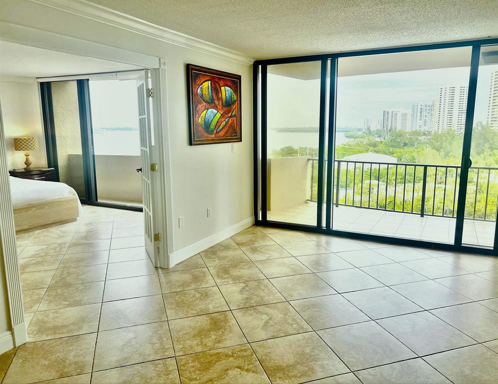 Enjoy spectacular warm turquoise water views of the ocean and the intercostal from every angle of the room!  This eighth floor northwest corner unit captures inexpressible and unspeakable sunsets. It offers beautiful upgrades, brand-new impact sliders throughout, brand new AC, hot water heater, one covered parking spot and much much more... Community amenities include beach access, tennis and pickle ball courts, sauna and exercise rooms, large pool deck with heated swimming pool. Singer Island is very conveniently located just 25 minutes from Palm Beach Airport to enjoy world class fishing, diving, golfing, shopping, dinning and many more!!! COME and SEE!!!