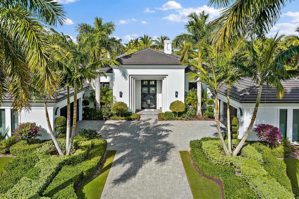 This Stunning Savoy Model home is situated on a very special private 1/2 acre lot in the sought after Grand Estate section of Old Palm Golf Club. Contemporary architecture designed by award winning Affiniti Architects and built by renowned Courchene Development with the finest appointments.  As you enter the 12 foot custom French foyer doors, you are drawn to the luxury mill work and ceiling treatments that lead you into the living room, featuring a beautiful Brazilian Sequoia marble surround linear fireplace and sweeping views of the lushly landscaped property with flowing palms, flowering trees and Bougainvillea.  The main living area displays white polished marble flooring with marble inlays throughout. The family room showcases an impressive, custom wine display and bar with modern gourmet kitchen with Irpinia cabinets and top of the line Thermador professional appliances.  A lavish master suite with dual baths and custom closets overlooks your own private oasis with generous spa, white patio and a variety of palms and flowering tropical trees. The secondary bedroom suites offer plenty of room for your family and guests.  Unwind on the generous covered loggia ideal for al fresco dining and entertaining with a summer kitchen perfectly positioned to enjoy the ambience of the tranquil water features.  Meticulously maintained and built with numerous custom details.  This Grand Estate home offers the ultimate in golf living and is not one to miss! 

Other custom features include volume ceilings ranging from 10' to 15' feet with extraordinary coffered ceiling treatments. Cove lighting in the dining room with coffered ceiling. Barrel ceiling with cove lighting in her master bath. 10 x 11 built out master closet (hers). Impressive contemporary built-ins in the family room and library. Remarkable millwork in every bedroom. Stunning outdoor Lennox fireplace with precast stone and wall niches with light grey stacked stone surround. Cabana bath for easy access to the covered loggia and pool area.  Generous laundry room with plenty of cabinetry for storage. Gorgeous beveled mirror with dark wood surround in the dining room. Lovely wood beams in the kitchen and family room. Master vestibule with 12 foot ceilings. Floor to ceiling windows. Grand mirror and floating dark wood shelves at the foyer. Custom built out butlers pantry and walk-in pantry. Plantation shutters through out.  Whole house generator.  2 car main garage 24x24 and 2 car secondary garage with a/c.
Tongue and groove ceilings at the foyer and loggia. Elegantly landscaped courtyard garden.  Pretty artificial turf in the back yard provides a maintenance and chemical free environment for family and pets. Gated and lushly landscaped, the property is surrounded by mature foliage offering maximum privacy. Cielo Court is truly special with only 5 homes on the street and no home across from you.  A private park to walk your dog with golf path that leads to the 18th hole and club house. 

There are no tee times to play on this newly renovated and pristine Raymond Floyd designed course. A separate 3 hole practice studio with Trackman V-1 swing analysis makes Old Palm Golf Club the perfect golf haven for the avid golfer or beginner. Club house is currently under renovation which will feature fine dining, cafe, lounge, men's and women's spa, fitness center, pool with cabanas, one bedroom casitas for rent. Membership includes beach membership at the Palm Beach Hilton on Singer Island, mins to Juno beach, airport, theatre and popular restaurants along the PGA corridor, Palm Beach and Jupiter.