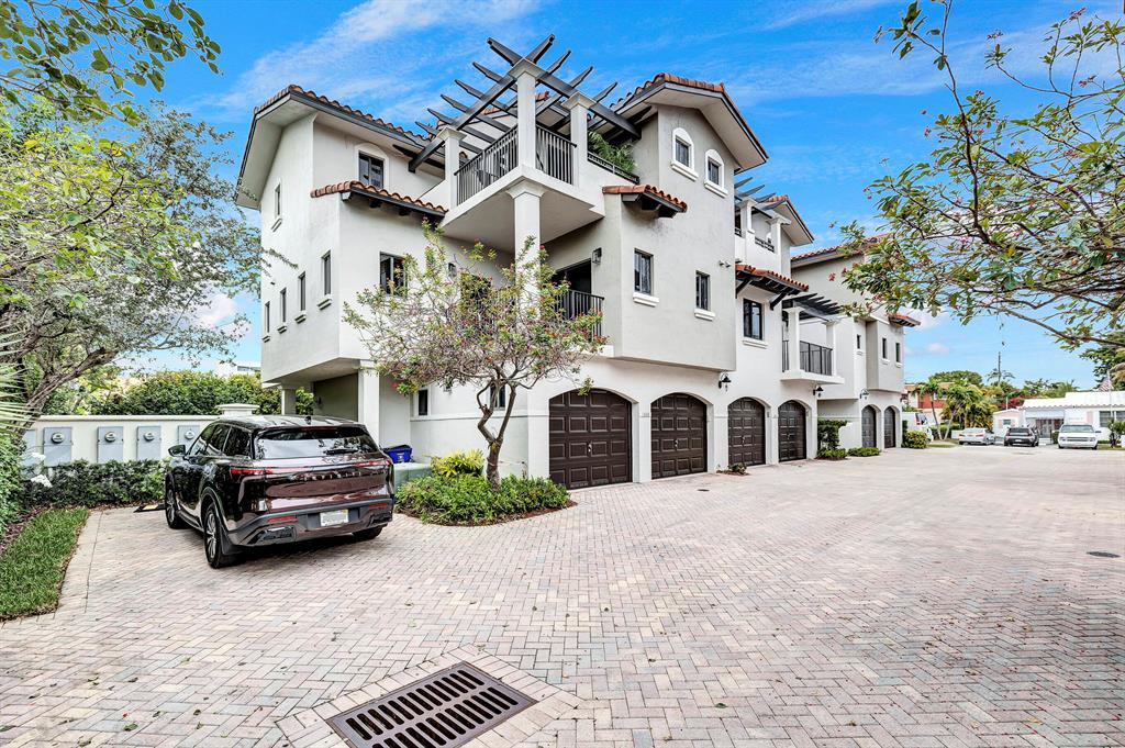 Villa Di Capri is located within walking distance of Deerfield Beach, between the intercostal and the ocean, steps from the Deerfield Pier, restaurants, and entertainment, and just blocks away from Boca Raton. This fantastic three-story, 3 Bedroom 2, Full, bathrooms and 2 half, bathrooms townhouse with an elevator was built and designed with high-quality finishes; this home features tile flooring throughout the first and second floors, hardwood flooring on the stairs, and third-story; remodeled kitchen with wood cabinets and quartzite countertops and stainless steel appliances and a balcony: a media room and living/dining on the second floor. A Lovely garden area by the main entrance, three balconies, and the upper deck invites sunlight in all day long; A spacious primary suite with