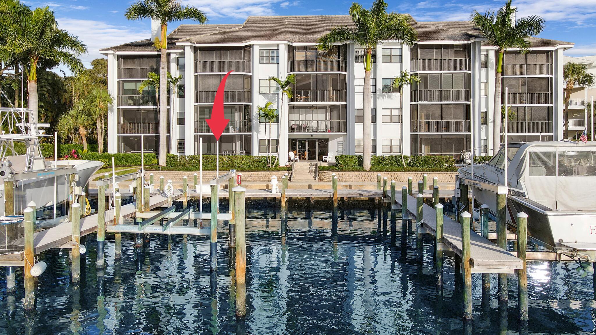A Boat Owners Dream!! Gorgeous completely remodeled & fully furnished condo located directly on the intracoastal in Bay Colony with a 42ft deeded boat slip & 24,000 lb. boat lift! The unit boasts direct marina & intracoastal views with private front & back entrances to the condo. If you're looking for a move-in-ready contemporary designed condo with a boat slip, this property is for you!  It's an all-in-one package that will fit up to a 44ft. boat & provides incredible sunset views from nearly every room! Bay Colony has 2 private marinas, a resort style pool, hot tub, fitness center, clubhouse, tennis courts, etc.All of this is just a bonus on top of the central location, being minutes to Juno Beach, restaurants & shopping!