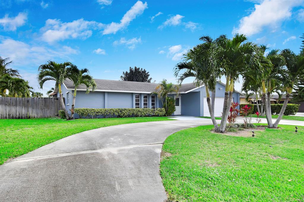 Welcome to this wonderful single family home located in the highly desirable Garden Isles neighborhood in Palm Beach Gardens. Along with its phenomenal location, this home features 3 large bedrooms (all with walk-in closets), 2 bathrooms, ~1800 square feet under air, a 2 car garage, large pool, and expansive .3 acre lot size. The semi-circle driveway and large covered patio by the pool create the perfect space for entertaining. Location is always everything and this property is close to all new office buildings, major transportation, shopping, and restaurants. This is a must see on your tour.