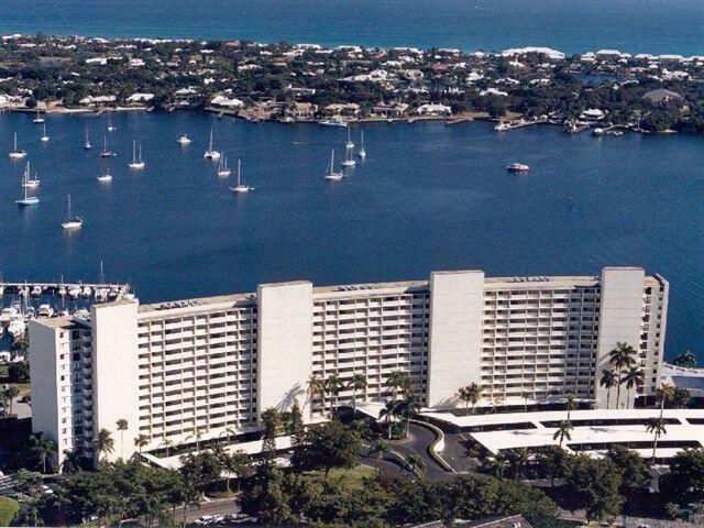 Breathtaking views of  Old Port Cove Lagoon,Atlantic Ocean and Mega Yacht Marinas. Watch boats and Mega Yachts come and go from your balcony. 38 feet of covered balcony with access from all rooms.Enjoy a brand new kitchen. Two spacious split floor plan bedrooms each with full bath. 2 mile walking path along the water around Old Port Cove. 24/7 manned gate. Belles''Restaurant on premises.