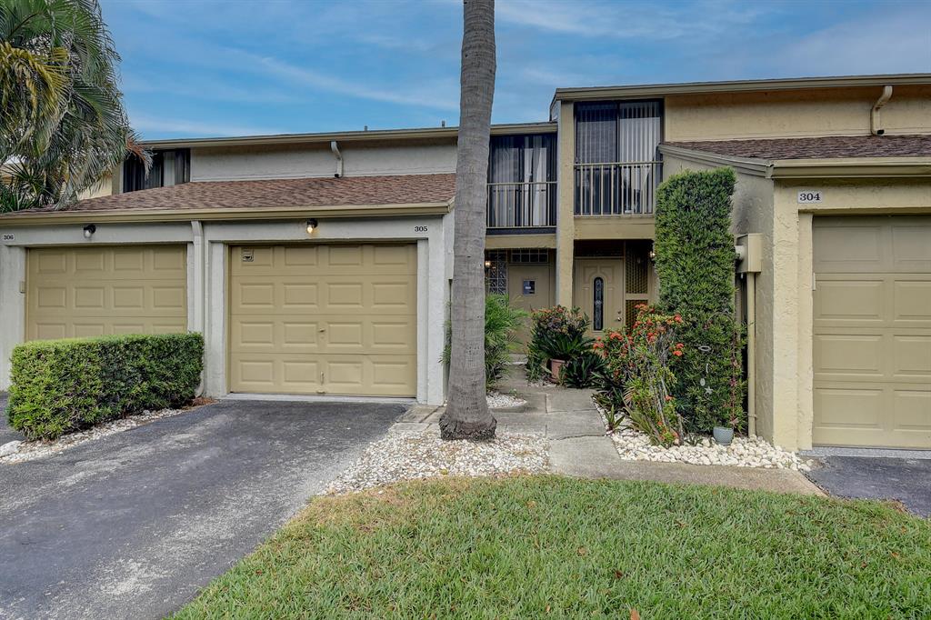EAST BOCA. Just listed and currently the only unit for sale at Boca Pinar. This townhome offers 2 bedrooms, 2 1/2 bathrooms + loft/den and attached garage is in a peaceful, quiet community in East Boca Raton and is ready for your fresh design and update ideas. The open floor plan on the first floor is light and bright and offers pliantly of room for your entire family. You can entertain or garden in your private back yard. The two large master bedrooms are located on the second floor (1 master bath has been updated) and there is a loft that can be used as a third bedroom or would make a perfect home office. Lots of closet space. Enjoy the convenience and security of the accordion hurricane shutters and the attached one car garage with additional driveway apace. The community offers a