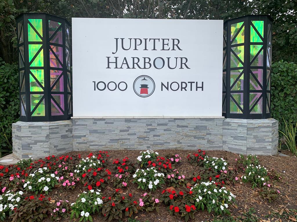 Jupiter Harbour gem located in the heart of Jupiter near some of the top dining, boating, recreation and shopping in Palm Beach County.  This desirable ground floor split plan unit has western exposure water views.  Enjoy watching sunsets from the back patio after playing tennis or take a nice kayak or paddle board ride off the community's own private launch area.  Very close to Maltz Theatre, Jupiter Lighthouse, Jupiter Beach and Beach Resort, Jupiter Inlet along with Harbourside Plaza and Publix Shopping plaza.  Also very near Cinepolis Luxury Movie Theatre.  This community boasts great walkability to both its Marina and the renowned 1000 North Restaurant.  Unit has assigned covered parking  spot as well. Newer AC but mostly original.  Ground floor units are easier to renovate as well.