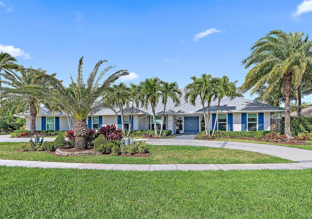 Look no further, this is the one!  Professionally reimagined and lovingly renovated.  This one-of-a-kind smart home located in the heart of Jupiter is just a short stroll to the beautiful dog friendly beach. Offering 5,000 sq. ft. of sheer delight, you can bring your fussiest buyers. No detail has been spared.  There are five bedrooms, a generous office, three full and one half-baths, all renovated and decorated by one of the North East's finest. The entire home was repainted and designer wallpaper installed throughout.  New kitchen backsplash and custom built-ins in the family room as well as custom window treatments are just a few of the stunning upgrades made to this home. Wainscotting, new wallpaper and new lighting make the formal dining room comfortable and enticing. On the technical side of things, no stone was left unturned. Five high-definition cameras anchored by a Luma Video System sets this home apart on every level.   Every aspect of the home from temperature control to the exterior sprinkler system can be managed from your phone. A Sonos system provides music throughout the home and on the oversized covered lanai.  The large screen TV and comfortable seating make this lanai a stand out.   The pool screening was replaced, Astro turf installed and new faux vine screening that provides a tropical oasis feel throughout the property. Two new HVAC systems, a new washer and dryer are just the beginning of the changes to this amazing property. Full house generator, tankless water heaters and updated irrigation system all complete the package.

