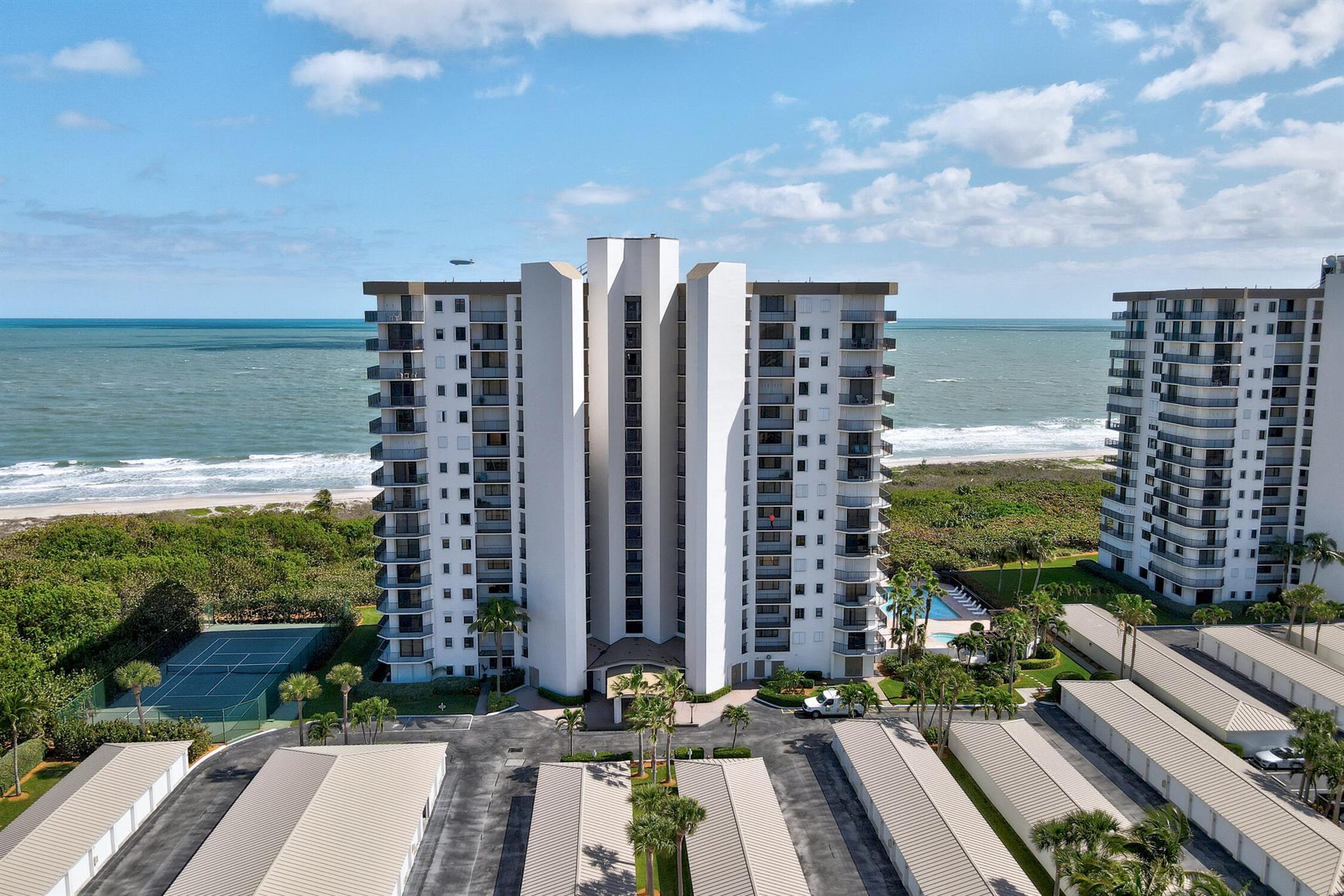 New price improvement. This is the lowest price per sqft on North Hutchinson Island with Custom upgrades throughout. This is not your typical 1200 Sqft boxy condo. This oceanfront unit is a spacious 1940 Sqft, beautifully updated, and has character. Updates include crown molding, custom cabinetry, Granite, SS appliances, 5'' baseboards, custom closets, high-end laminate floors, 2021 water heater, and much more. This unit is direct oceanfront, on one of the best beaches on the Treasure Coast, and comes with a shared space garageport. Definitely a must see. Don't miss out on this Unbeatable Price and Unparalleled Luxury!
