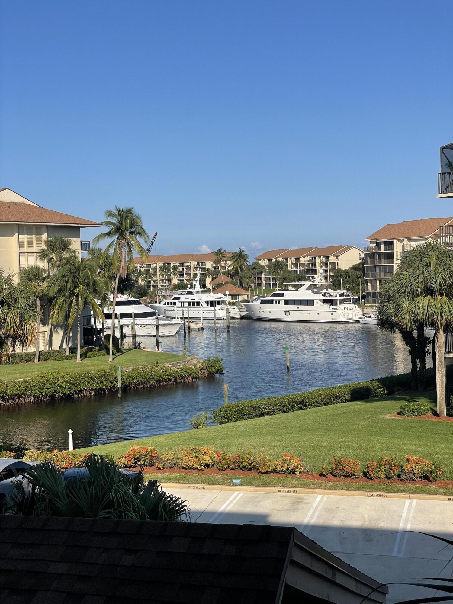 Enjoy a bit of paradise in this 2/2 condo directly on the intracoastal. Take in the view from your screened and tiled patio! This condo has new luxury vinyl flooring, crown molding, all new interior doors with beautiful crystal door knobs. freshly painted, updated master bath and more! There is even a bonus room that can be utilized as an office or even guest room. Spectacular view of the marina from your front door! Walking distance to beach, shopping and dining! This is a must see. Great opportunity to live the dream here! Pictures will be up soon!