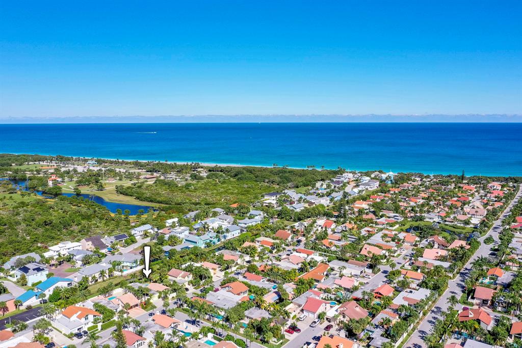 Come and enjoy the beautiful, gated community of Ocean Walk and live just steps from the beach in this bright & cozy 3BR/3BA pool home that has tons of character and Florida charm! An amazing formal living & dining area opens up to the gorgeous kitchen - which is really the centerpiece of the home as it opens up to the incredible outdoor patio and pool area. Here you'll enjoy an awesome northern exposure meaning it's glorious all year round! The family room has an east exposure that allows for fantastic sunrises in the morning, and the primary bedroom is both private and spacious with enough closet room for everyone. This home is perfect for beach lovers and those who want to make the most of the Florida lifestyle. Don't miss this incredible opportunity!