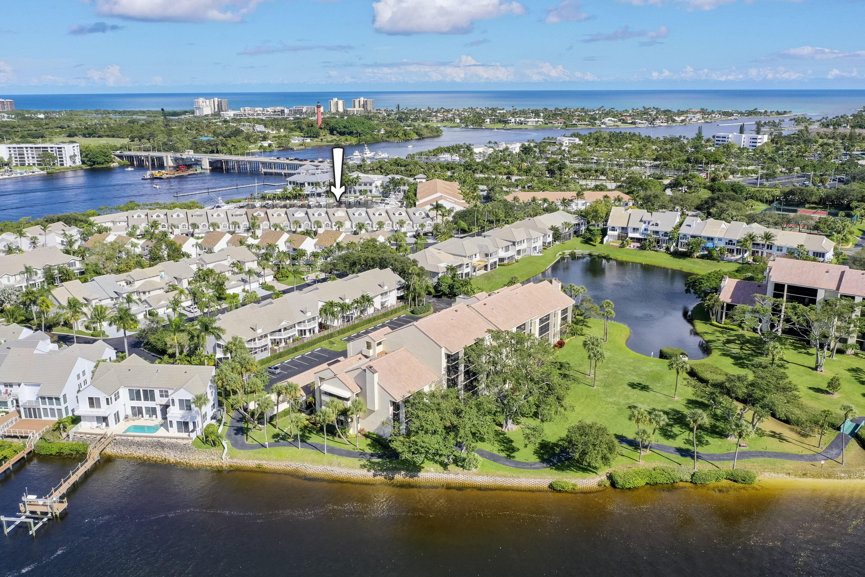 Sweeping views from this remodeled condo located in exclusive Jupiter Harbour! Stainless steel appliances, wet bar, screened lanai, wood cabinets, walk in closets, tile floors and much more - this is a MUST SEE. Jupiter Harbour offers a 24-hour manned guard gate, resort style pool, tennis and pickleball, and on site management. Conveniently located within walking distance of many of Jupiter's waterfront restaurants and Harborside Place. Marina on site with rental slips available. Launch your kayak and paddle boards from their sandy beach on the Intracoastal Waterway. NO PETS. Mere minutes from the beach and a quick drive to Palm Beach International Airport. Outdoor furniture is negotiable.